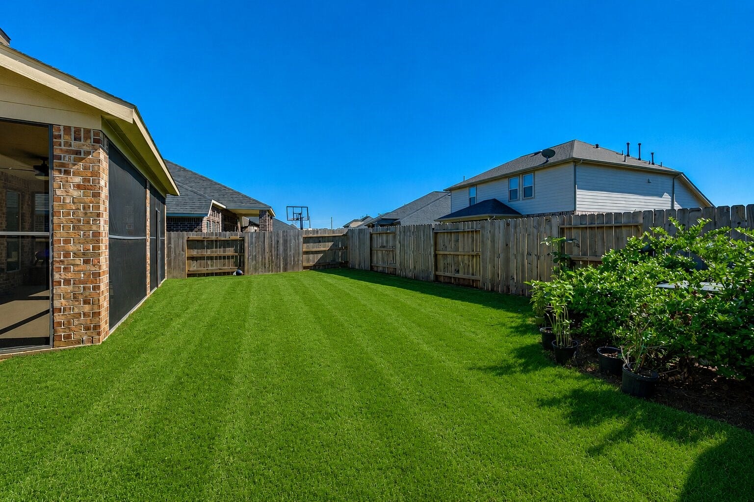23335 Peareson Bend Lane, Richmond, TX 77469 Enjoy relaxing evenings in the large screened-in patio offering a comfortable outdoor living space perfect for entertaining, dining, or unwinding year-round
