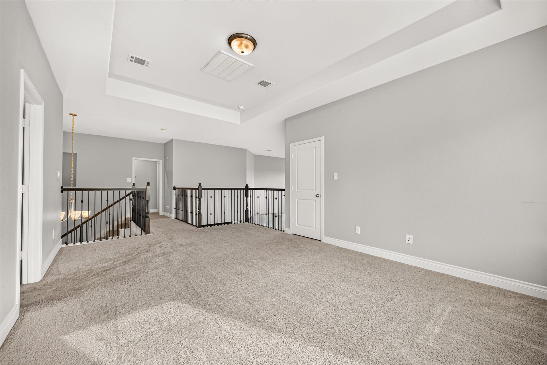 23335 Peareson Bend Lane, Richmond, TX 77469 Large game room with large windows offering the perfect space for family fun, game nights, movie marathons, and entertaining guests