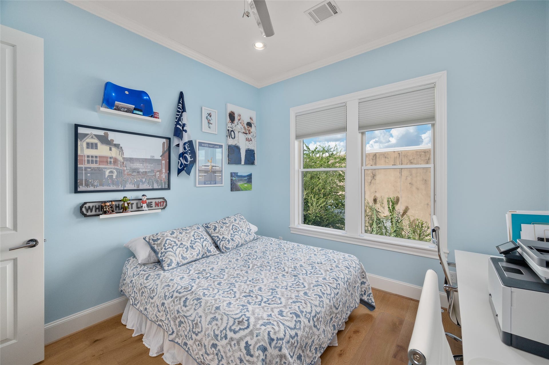7554 Little Caprese Lane, Houston, TX 77055 Secondary bedroom with two large windows and ceiling fan.