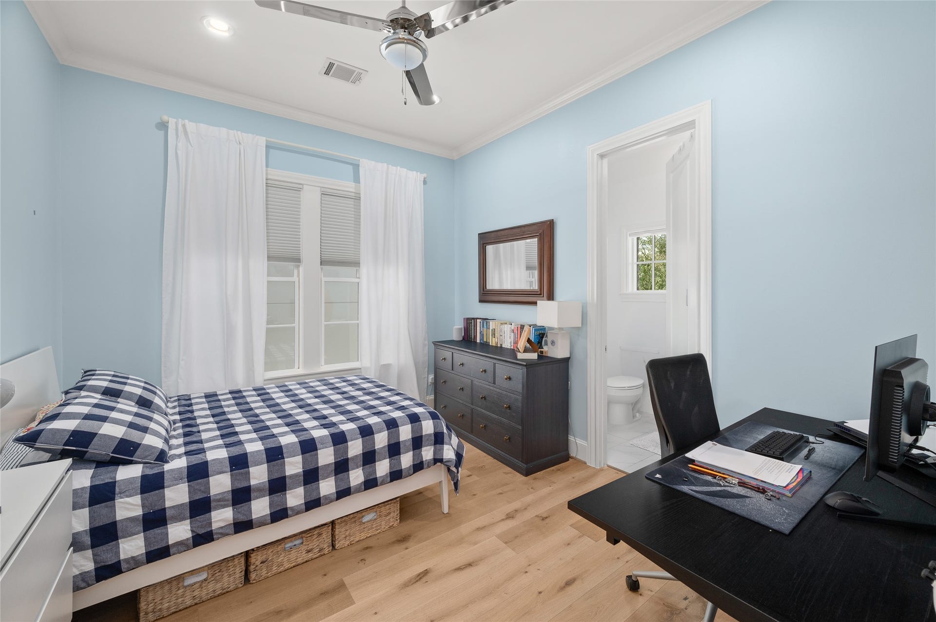 7554 Little Caprese Lane, Houston, TX 77055 Secondary bedroom with en-suite bathroom and windows.