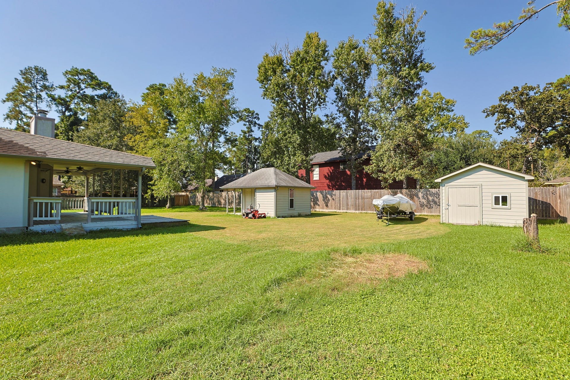 10403 Twin Oak Drive, Conroe, TX 77385 Backyard is fenced with plenty of space for a boat and/or RV
