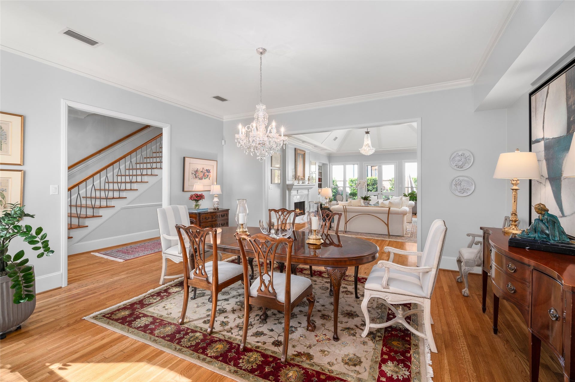 [Dining Room]
This spectacular vista travels through the formal rooms to the rear patio. Cased opening divides the living and dining room, allowing a seamless flow when entertaining.