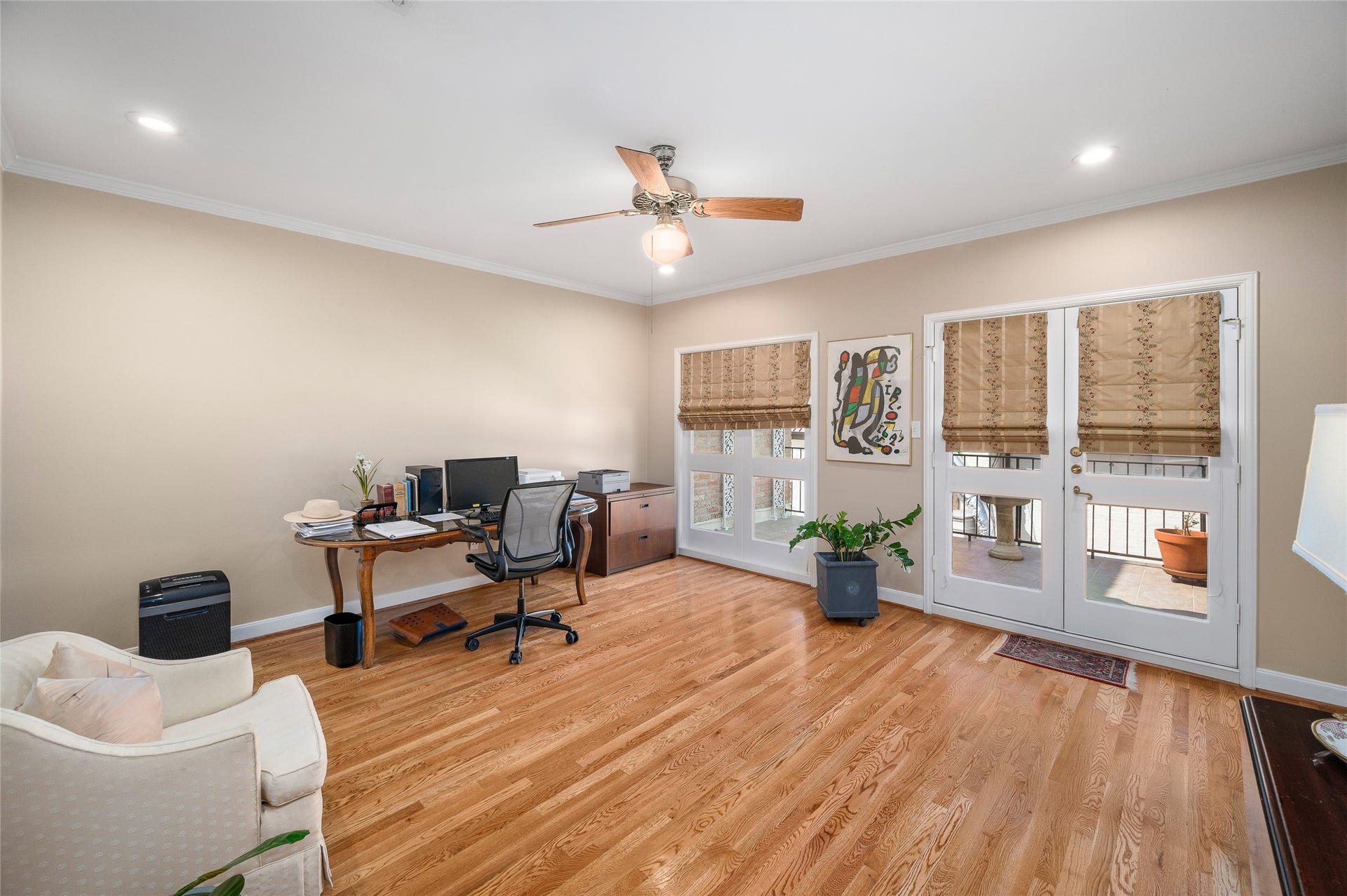 [Secondary Bedroom / Den/ Office]
This room shares a Hollywood bath, and has double glass doors that opens to the to the roof garden.