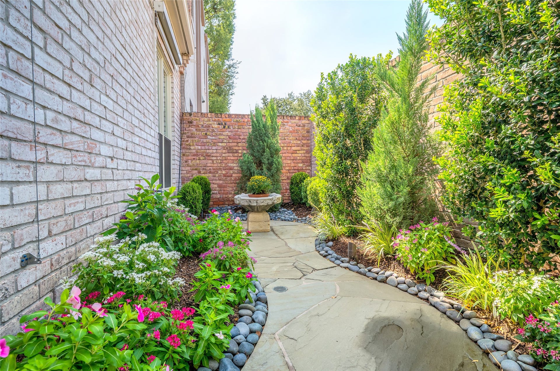 [Rear Patio]
View from living room to the primary suite. A very private outdoor space.