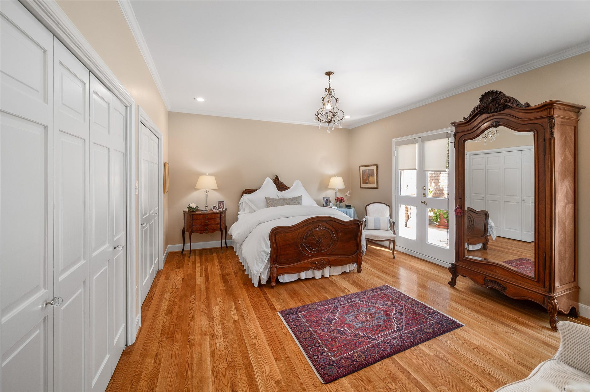 [En Suite Bedroom]
Lovely secondary bedroom with 2 deep, step-in closets, and a balconet window overlooking the roof garden.