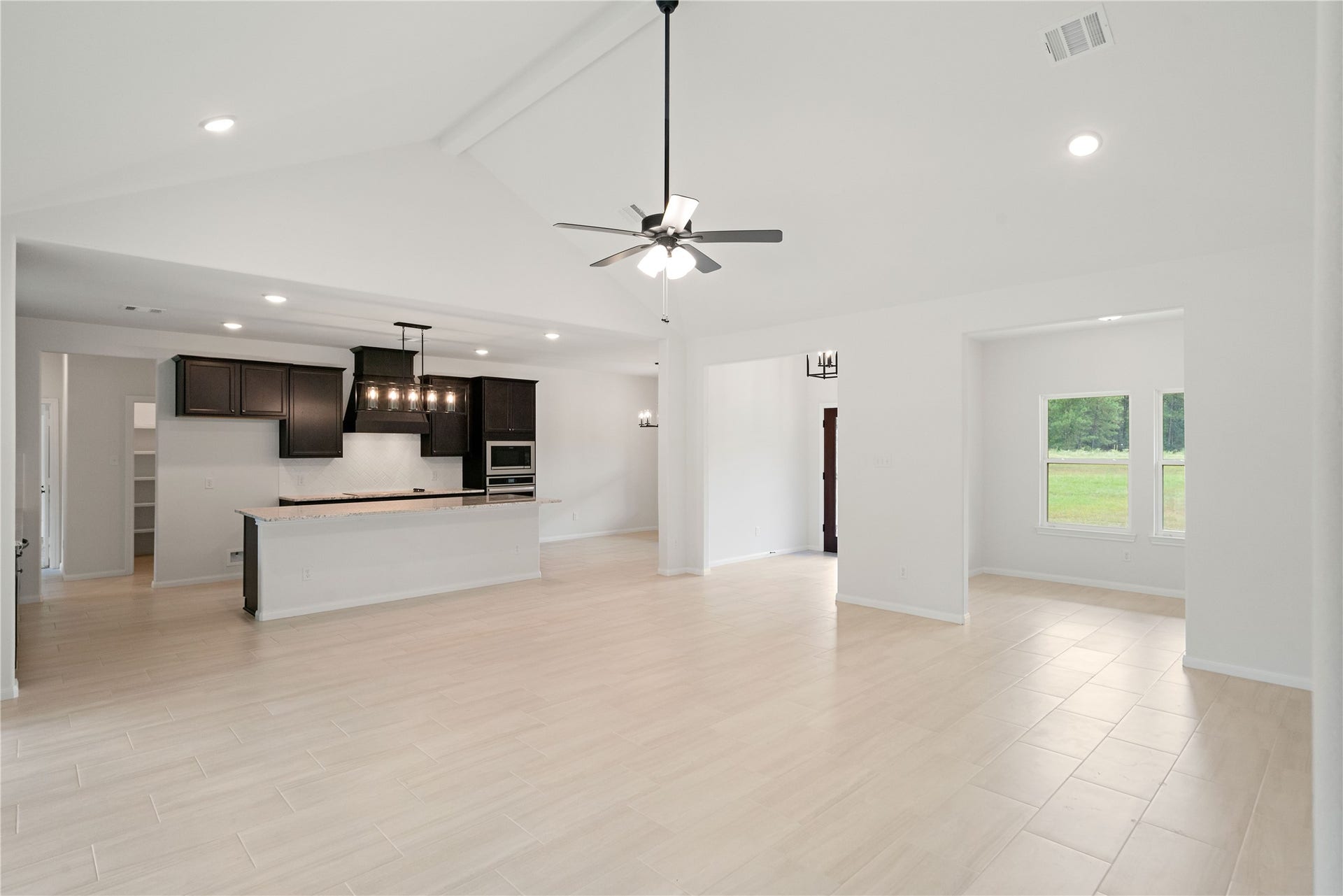 21203 Peach Wood Court, Cleveland, TX 77328 View of the kitchen from the living room