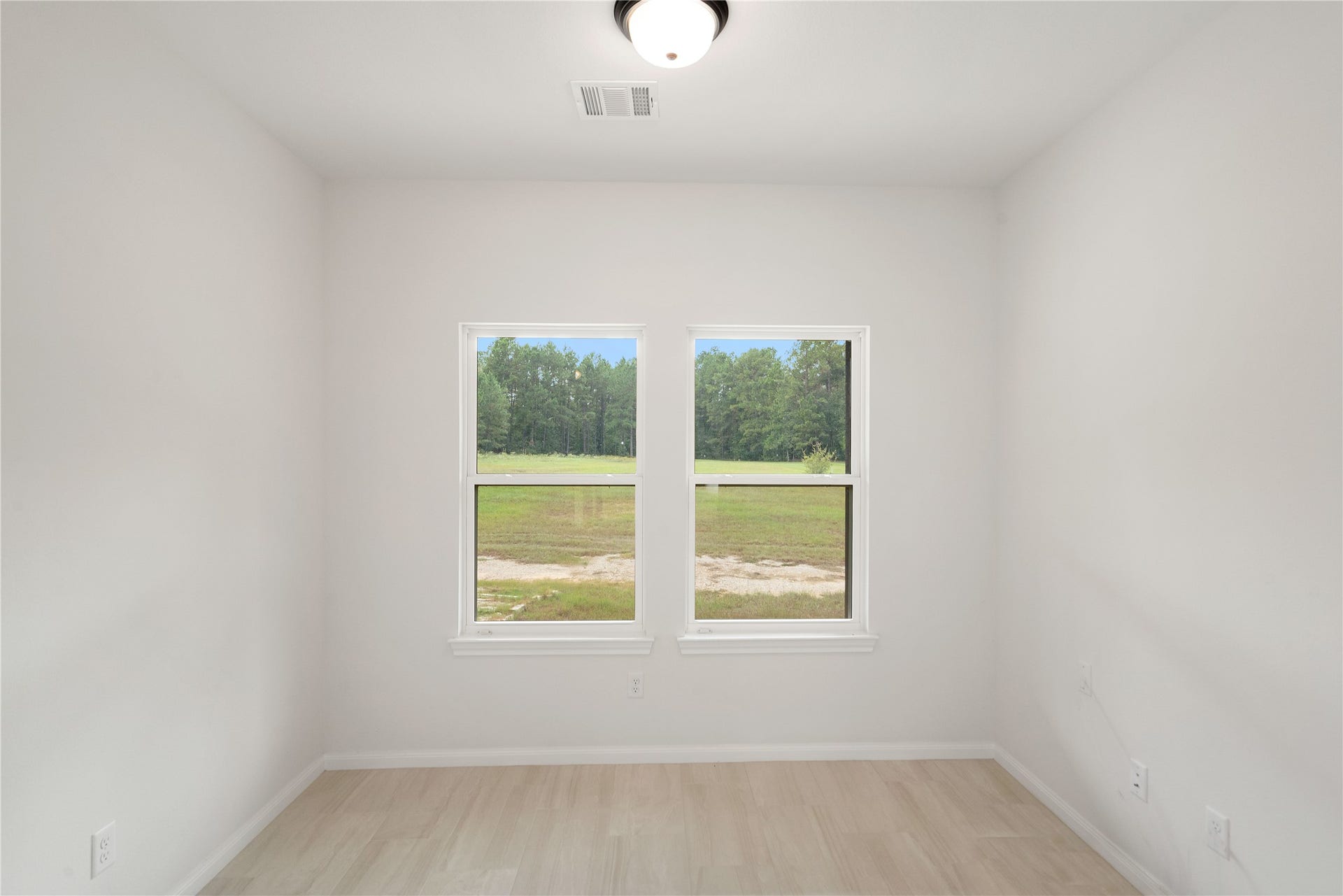 21203 Peach Wood Court, Cleveland, TX 77328 Office is conveniently located off the living room.