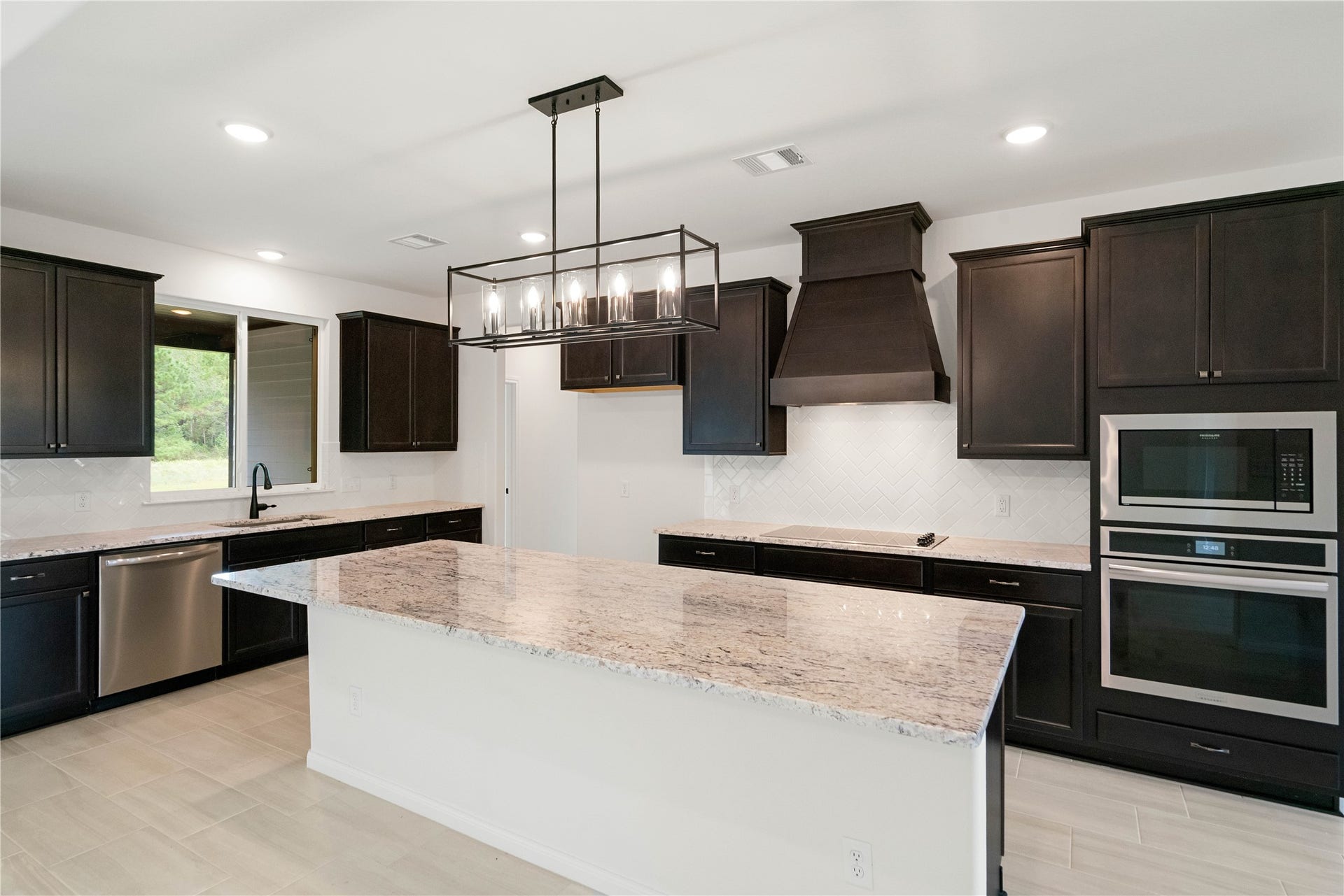 21203 Peach Wood Court, Cleveland, TX 77328 Island kitchen with lots of storage