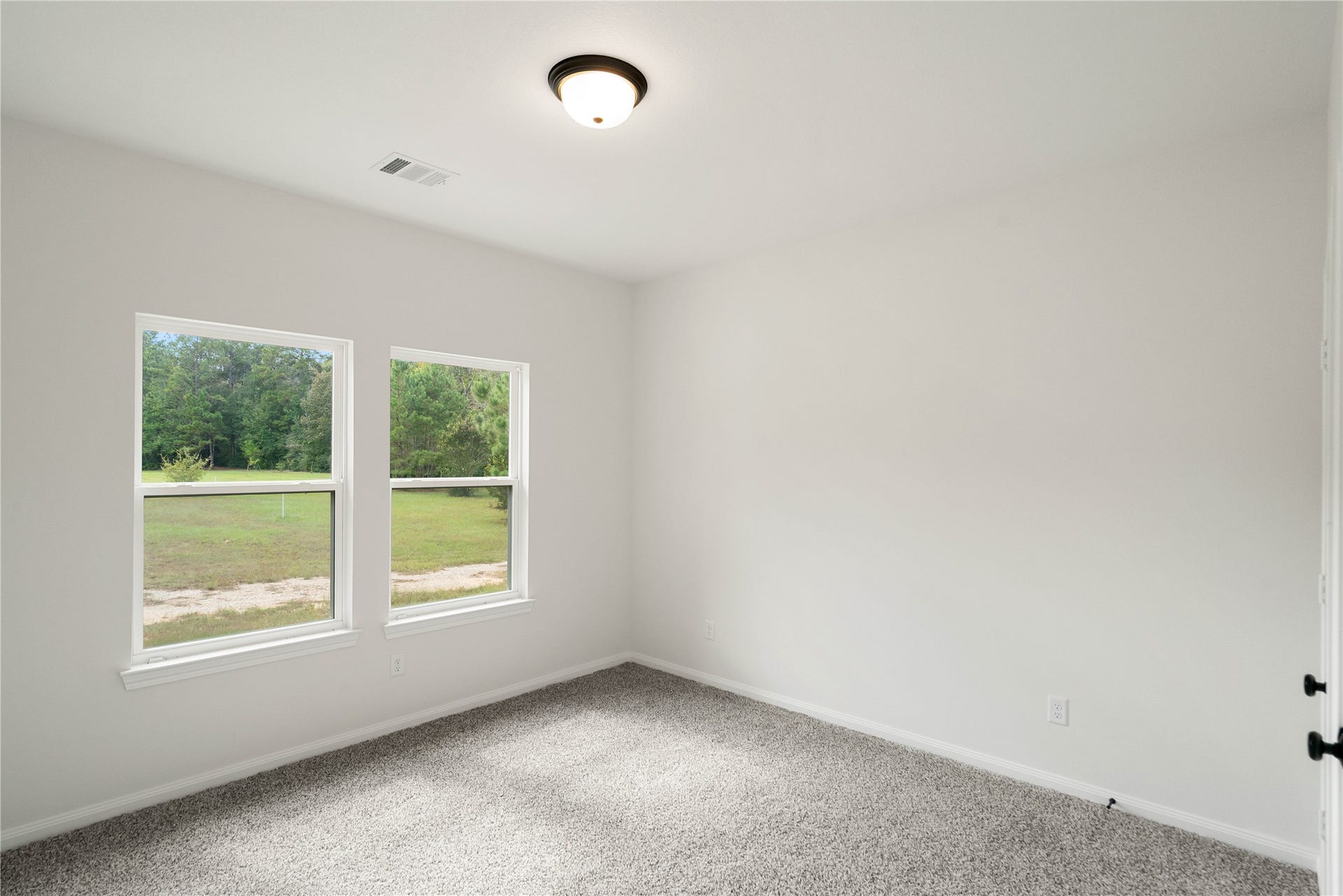21203 Peach Wood Court, Cleveland, TX 77328 2nd bedroom without staging