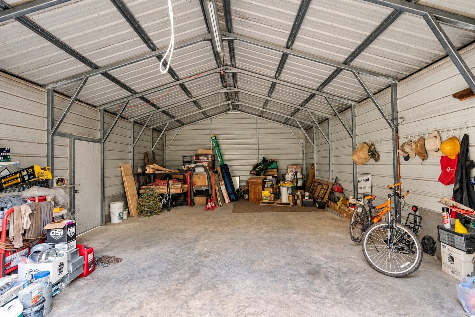 21203 Peach Wood Court, Cleveland, TX 77328 Inside the shop. The shop does have some electrical ran.