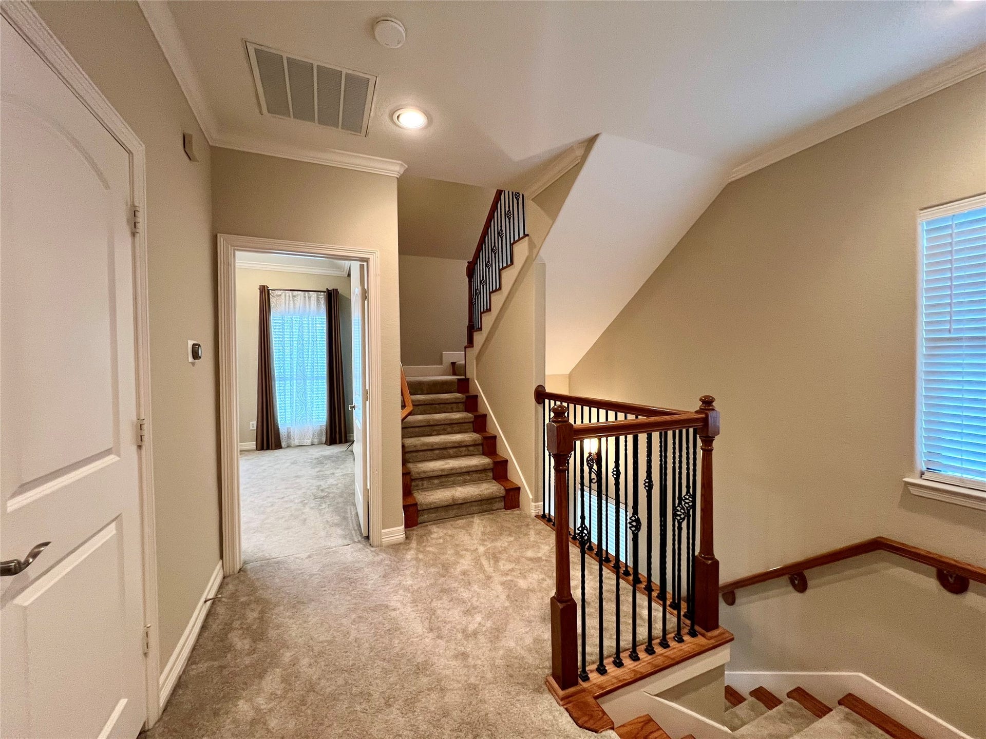 1625 Cohn Street, Houston, TX 77007 stairs next to the master bedroom leads to the rooftop open terrace