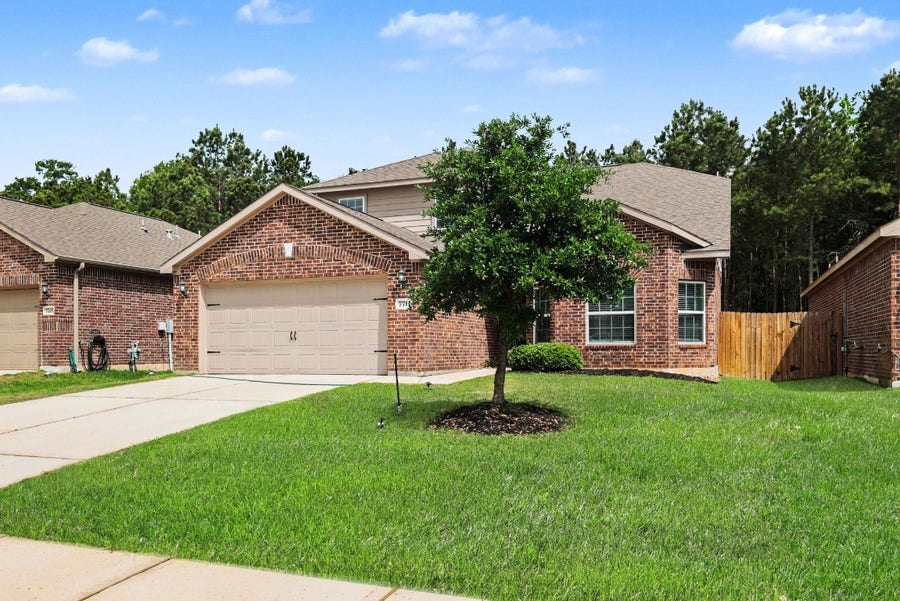 Property photo for 7711 Boulder Sunstone Lane, Conroe, TX
