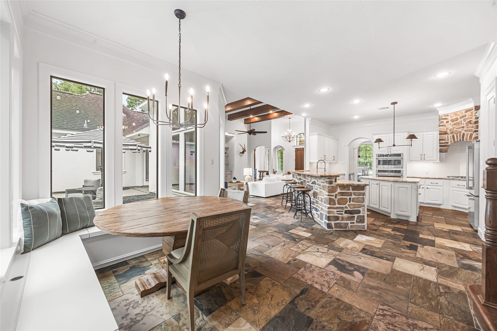 3810 Benders Lane, Spring, TX 77386 An open-concept layout seamlessly connects the kitchen, breakfast area, and living room.