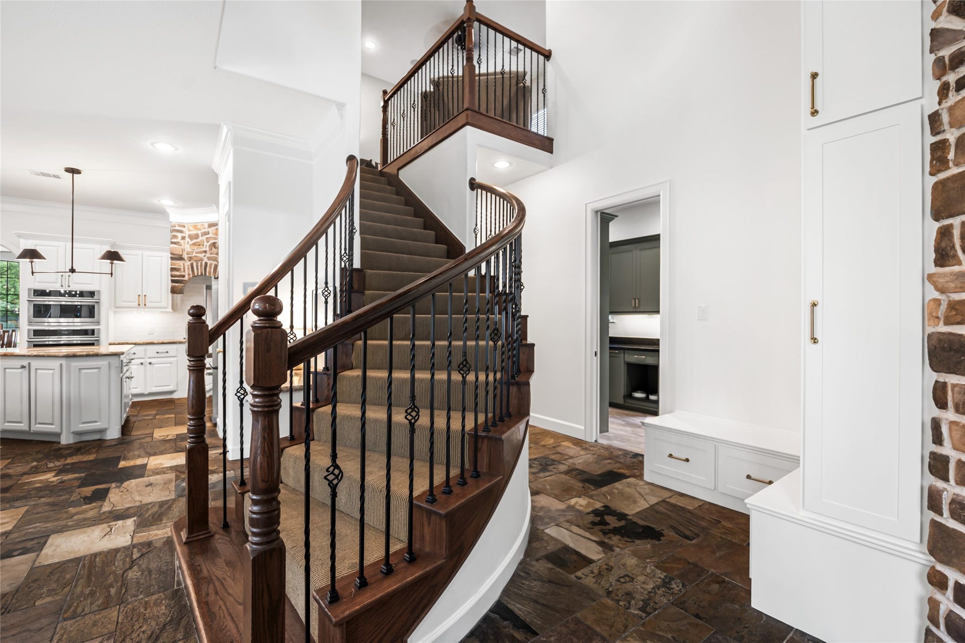 3810 Benders Lane, Spring, TX 77386 Spacious mud room located just off the garage entry features newly built custom cabinetry, smart storage solutions, and a dedicated charging station for everyday convenience.