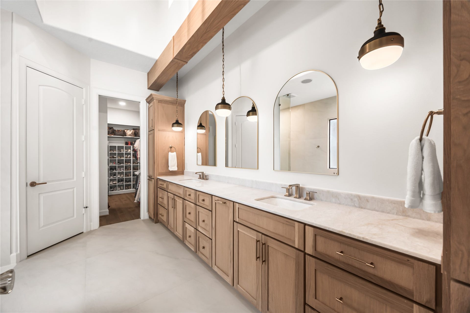3810 Benders Lane, Spring, TX 77386 Beautifully updated bathroom showcasing a modern shower, relaxing soaking tub, refreshed cabinetry, and elegant design details throughout.
