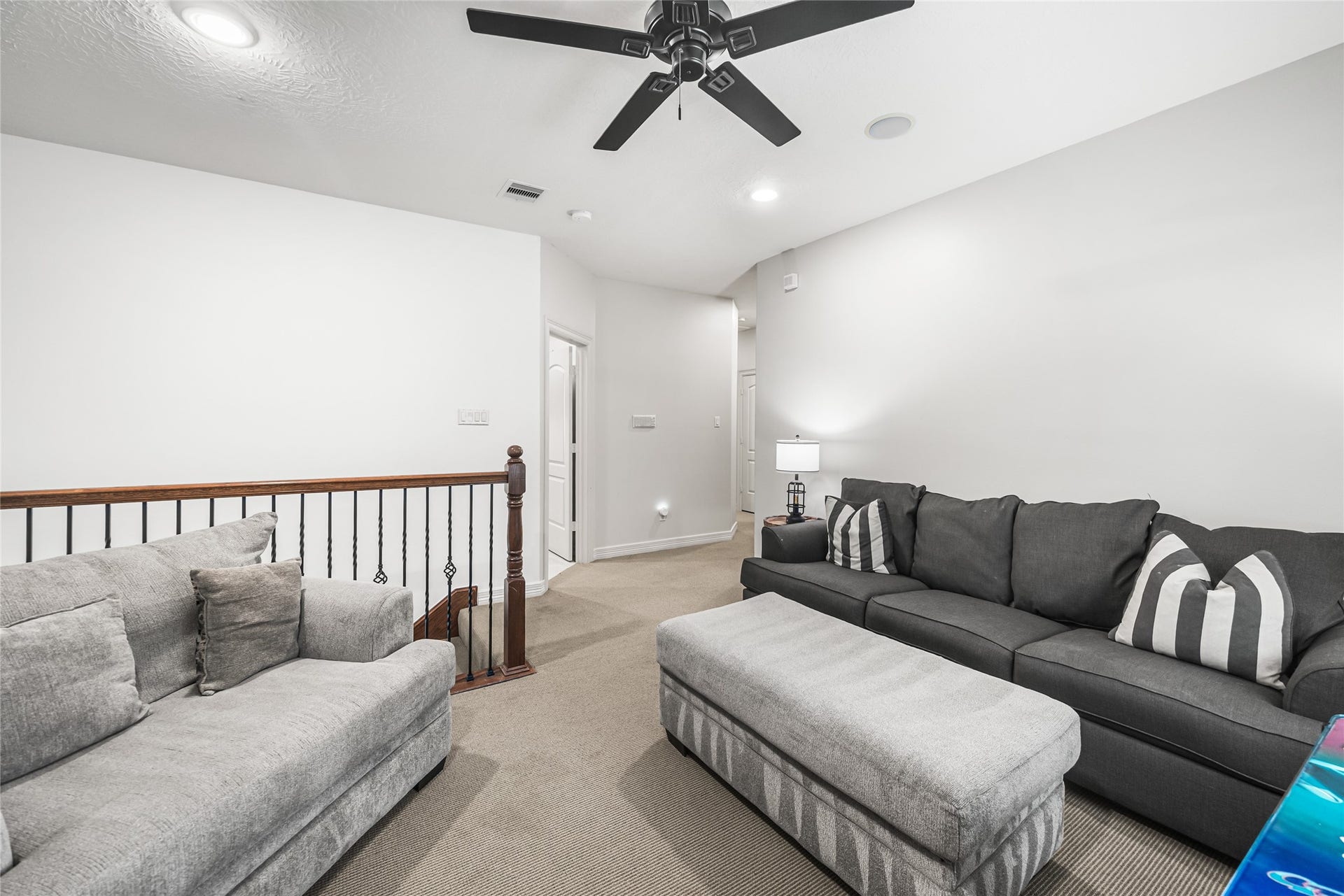 3810 Benders Lane, Spring, TX 77386 Upstairs features three spacious bedrooms, two full bathrooms, and a convenient bar area, creating the perfect space for family and guests.