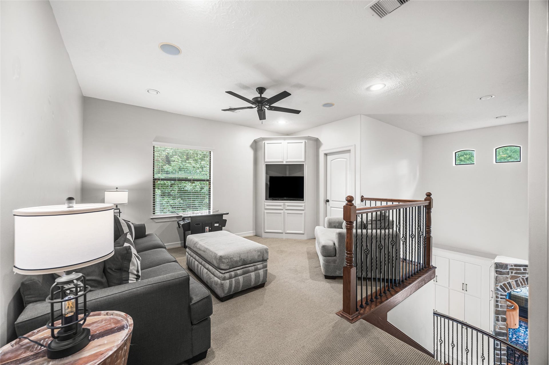 3810 Benders Lane, Spring, TX 77386 Versatile upstairs flex space provides the perfect canvas for your needs, whether used as a game room, entertainment area, office, or additional living space.