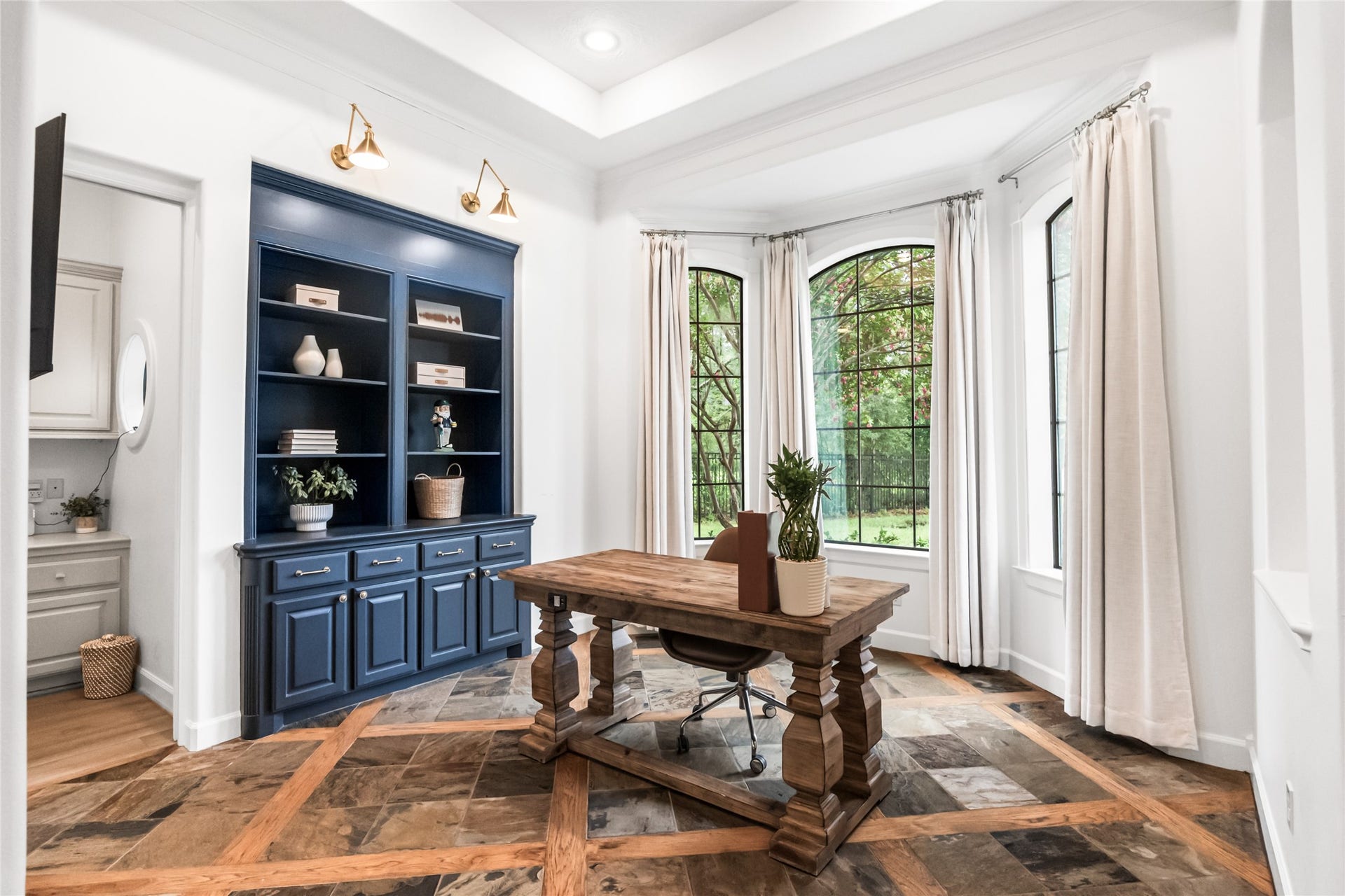 3810 Benders Lane, Spring, TX 77386 Spacious office with custom built-ins and a separate secondary office area, providing the perfect setup for multiple workspaces.