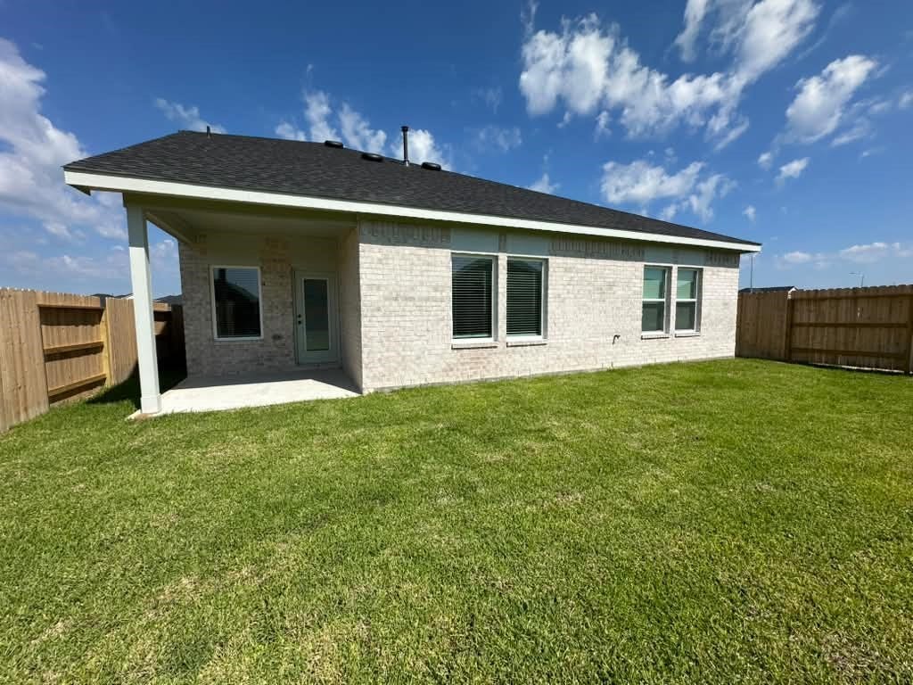 22015 Messina Springs Drive, Hockley, TX 77447 Back view with backyard