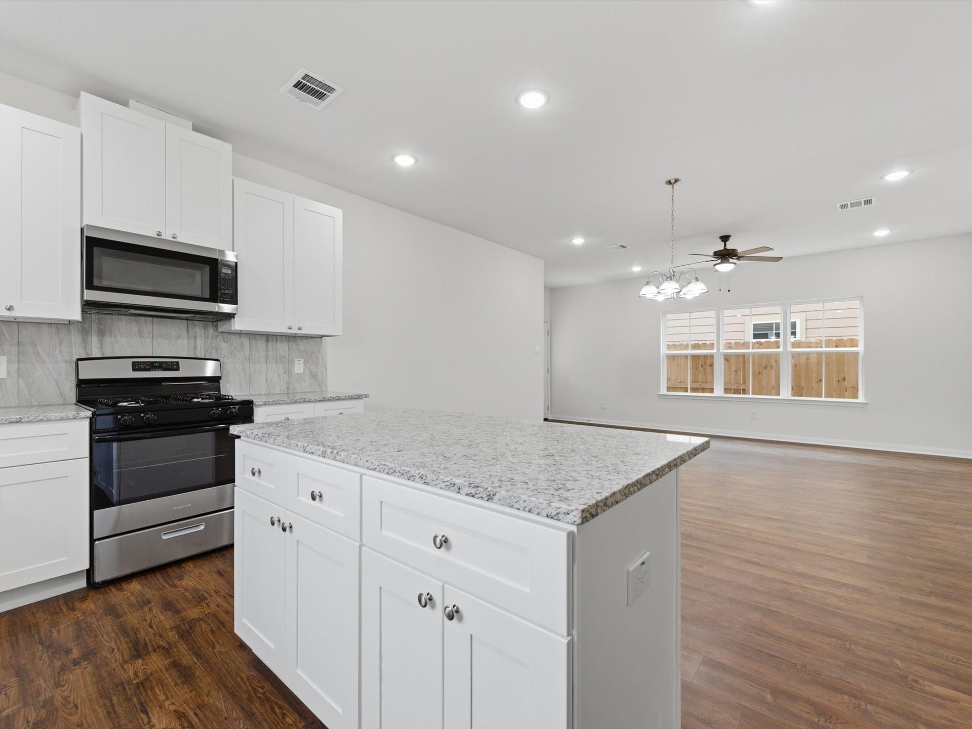 The seamless flow from the kitchen to the living space keeps everyone connected and makes entertaining effortless.