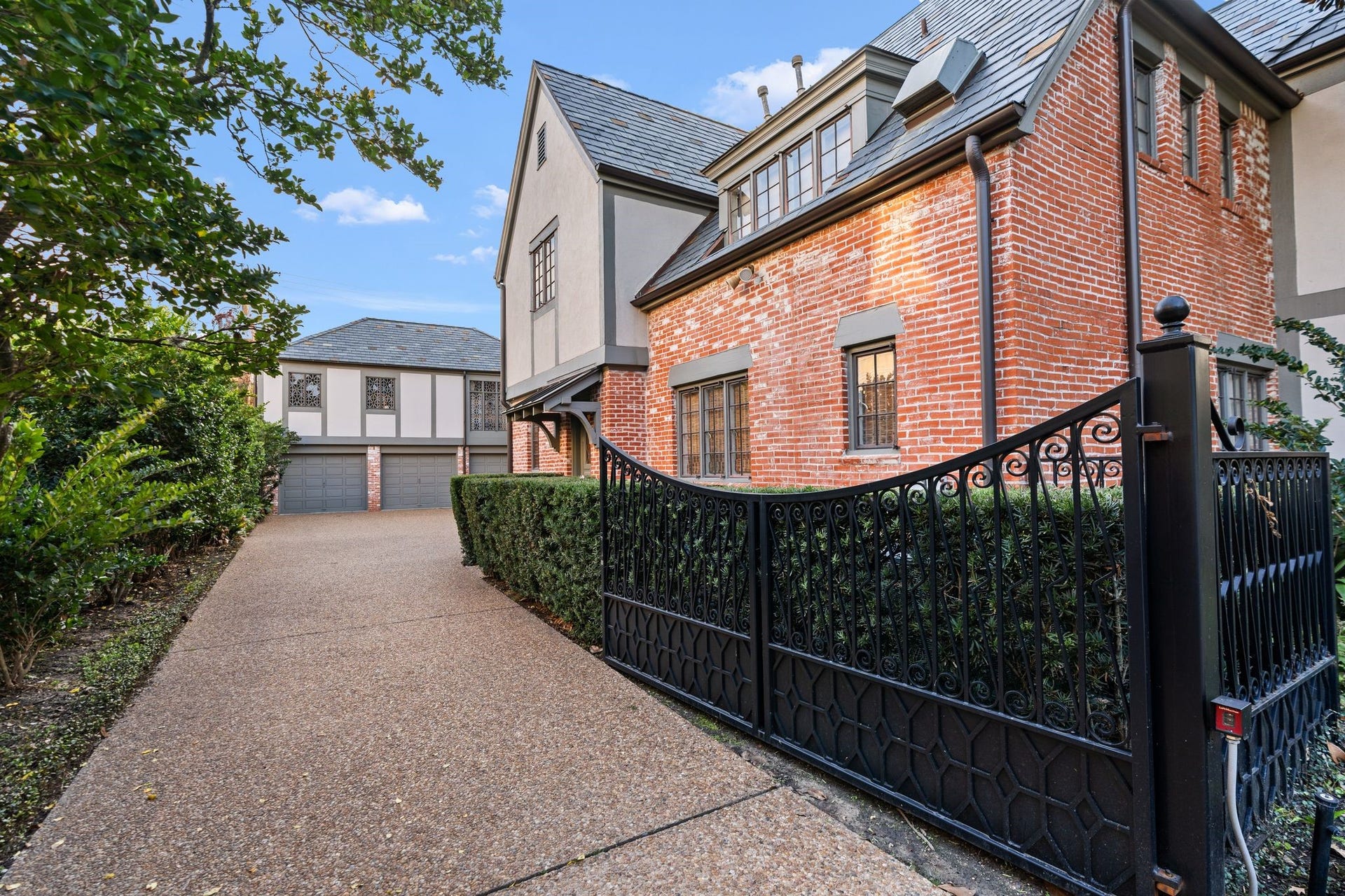 [Side Elevation]
Automatic, custom-built driveway gates.