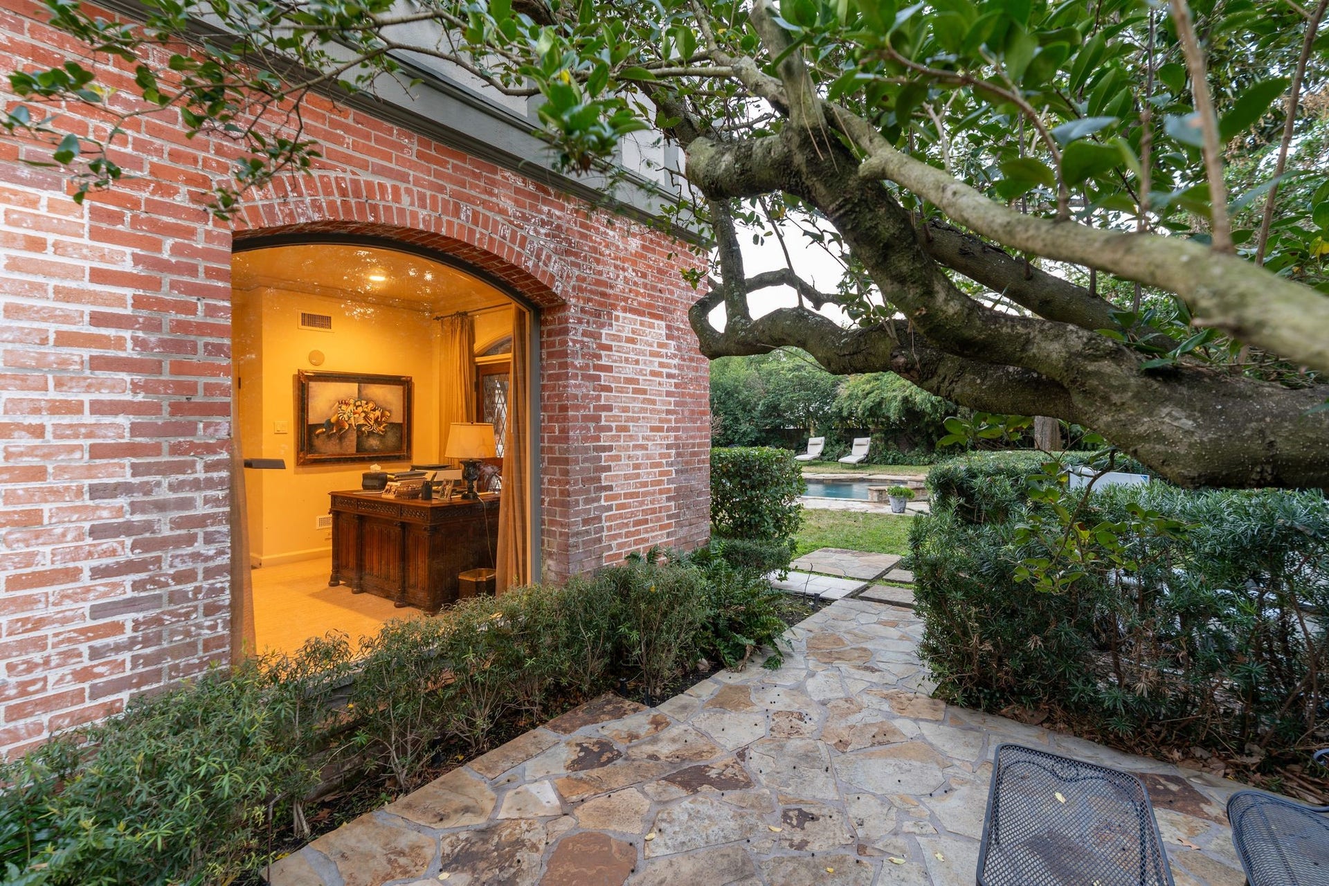 [Side Patio]
This flagstone patio is positioned beside the sunroom/study.