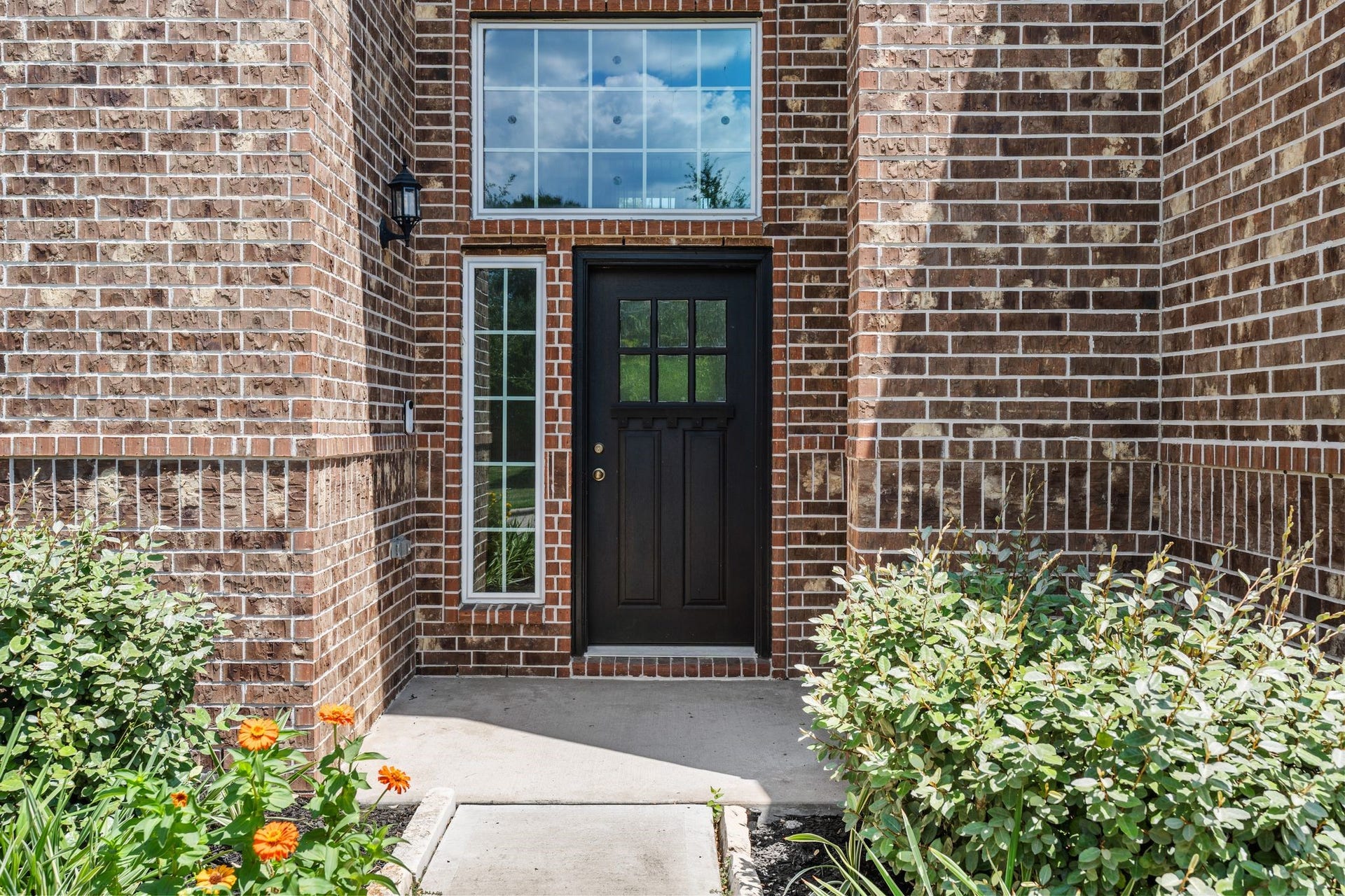 314 Arbor Ranch Circle, Richmond, TX 77469 Front entry framed by brick
