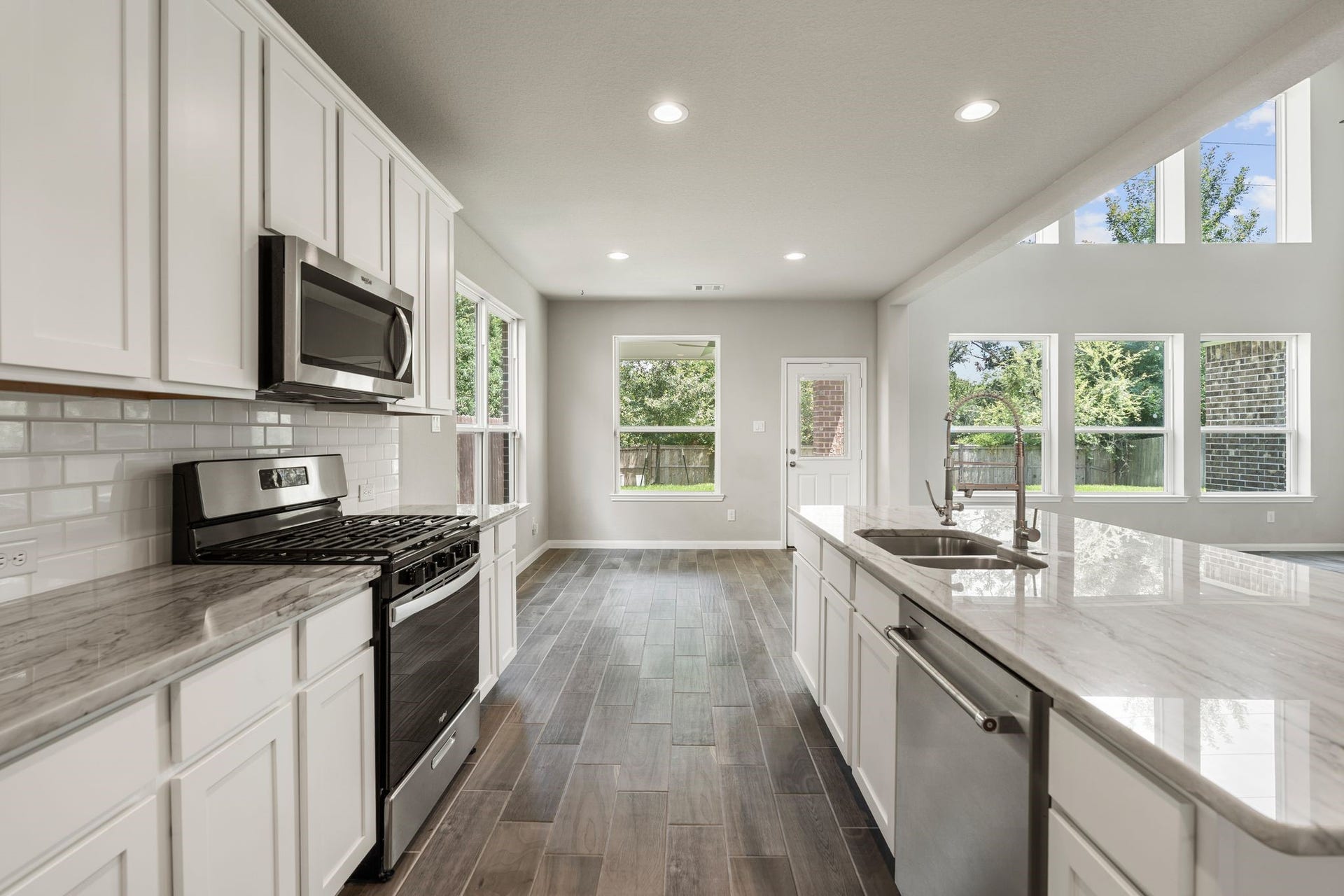 314 Arbor Ranch Circle, Richmond, TX 77469 Lots of natural light open to kitchen area!