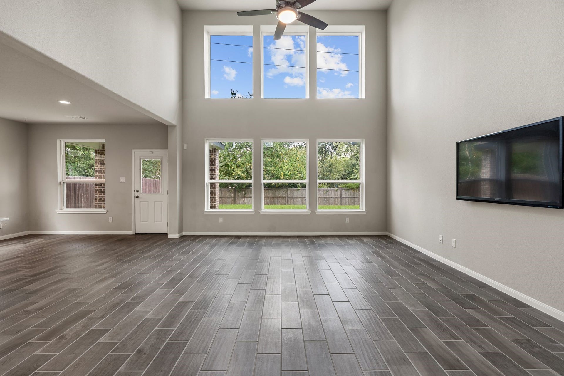314 Arbor Ranch Circle, Richmond, TX 77469 Expansive windows that are able to open fill the living space with sunlight