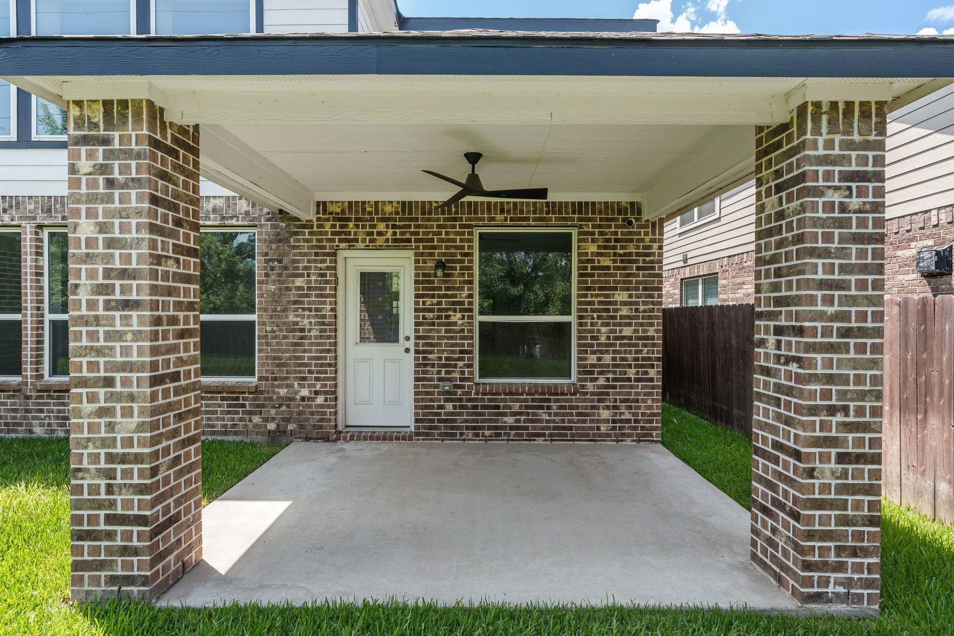 314 Arbor Ranch Circle, Richmond, TX 77469 Covered patio with fan added, perfect for outdoor entertaining