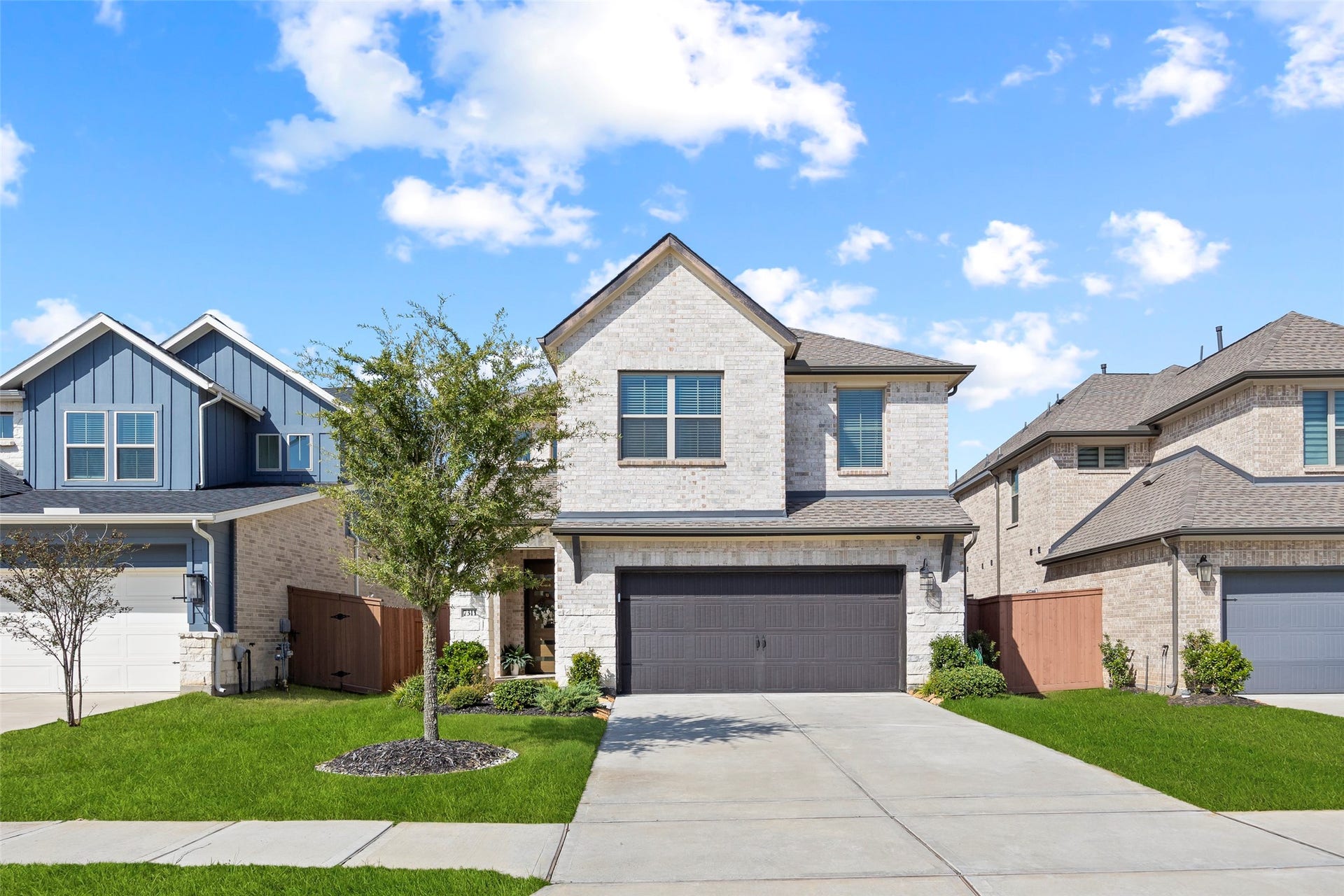 7311 Winding Aster Way, Katy, TX 77493 Welcome to 7311 Winding Aster Way in the master-planned community of Elyson. Built by Westin Homes in 2024, this two-story residence offers four bedrooms, three full baths and one half bath across approximately 2,425 square feet. Light brick, contrasting trim and a two-car garage create an inviting first impression.
