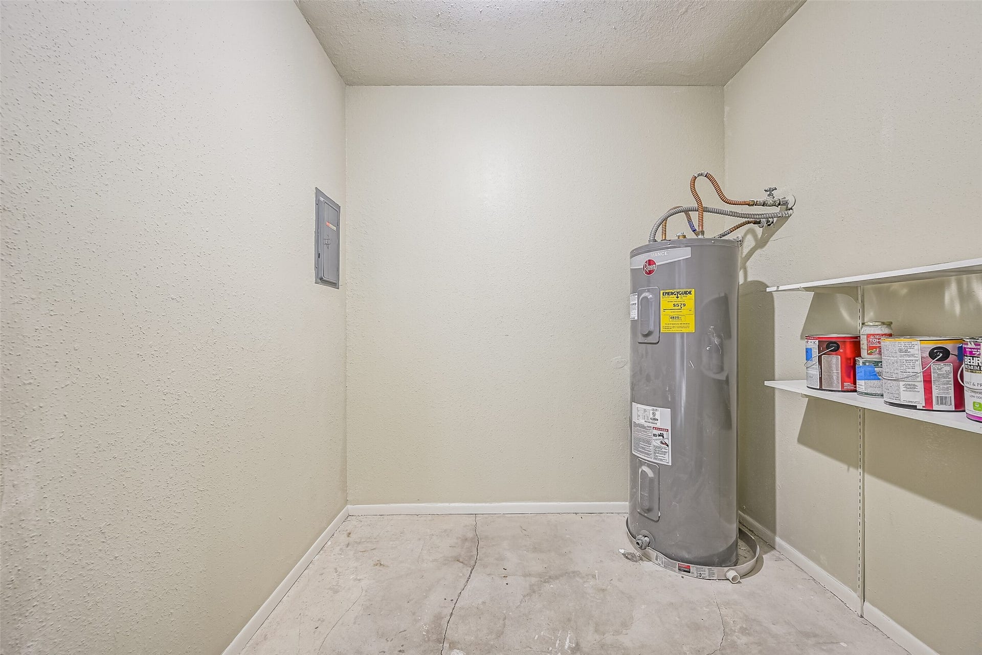 5005 Georgi Lane, #155, Houston, TX 77092 Located on the oversized covered balcony, this exterior storage closet offers additional space for seasonal items, household supplies & other belongings. Built-in shelving provides room for organization, while the water heater is tucked away here rather than occupying valuable interior living space.