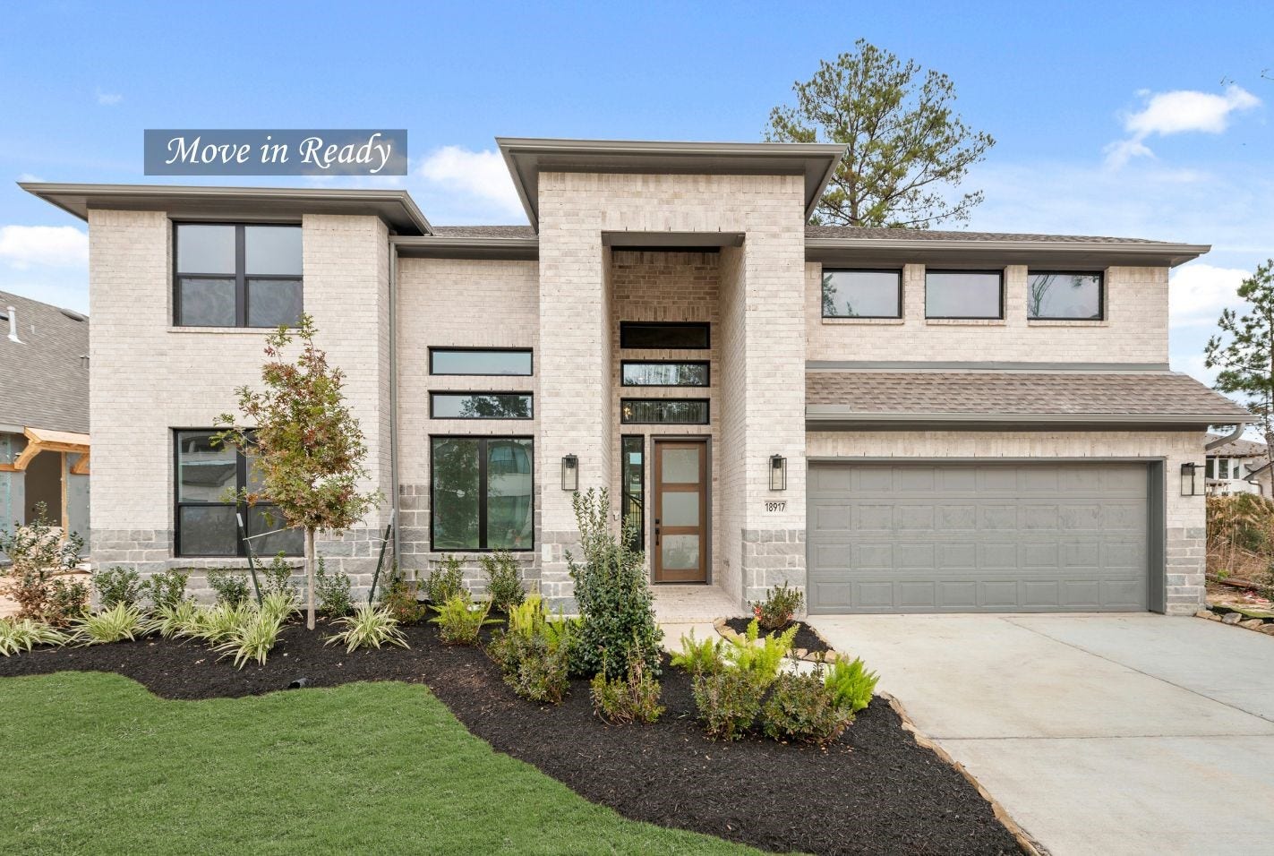 18917 Moonriver Street, Conroe, TX 77302 Move in Ready. Westin Homes *New Construction* Carter IX Plan. Grass is digitally enhanced.