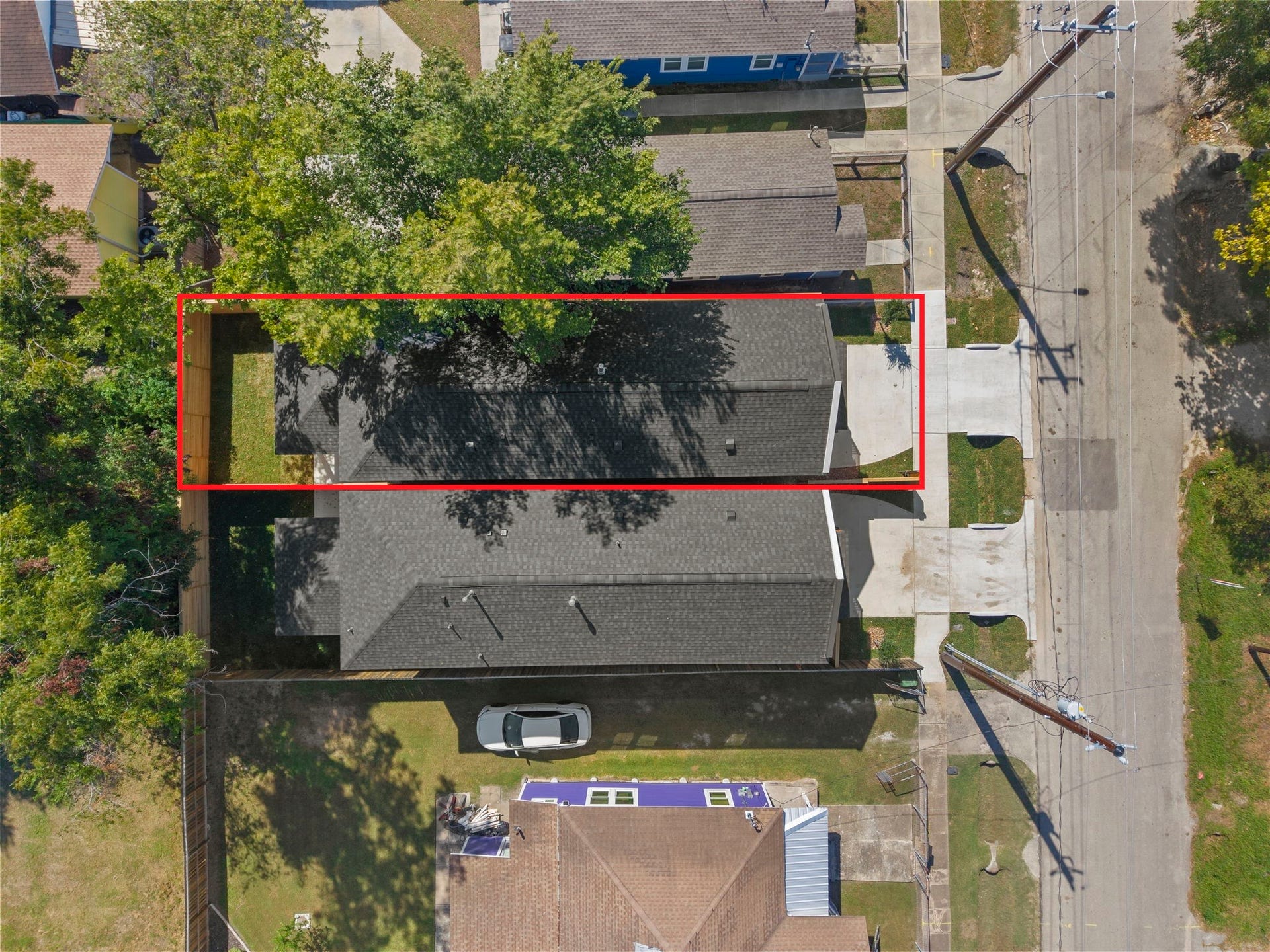 2412 Terry Street, #A, Houston, TX 77009 This top-down aerial shot highlights the rectangular property footprint and well-defined site boundaries. The footprint highlights a dedicated front driveway, a streamlined main structure, and a private enclosed backyard set.