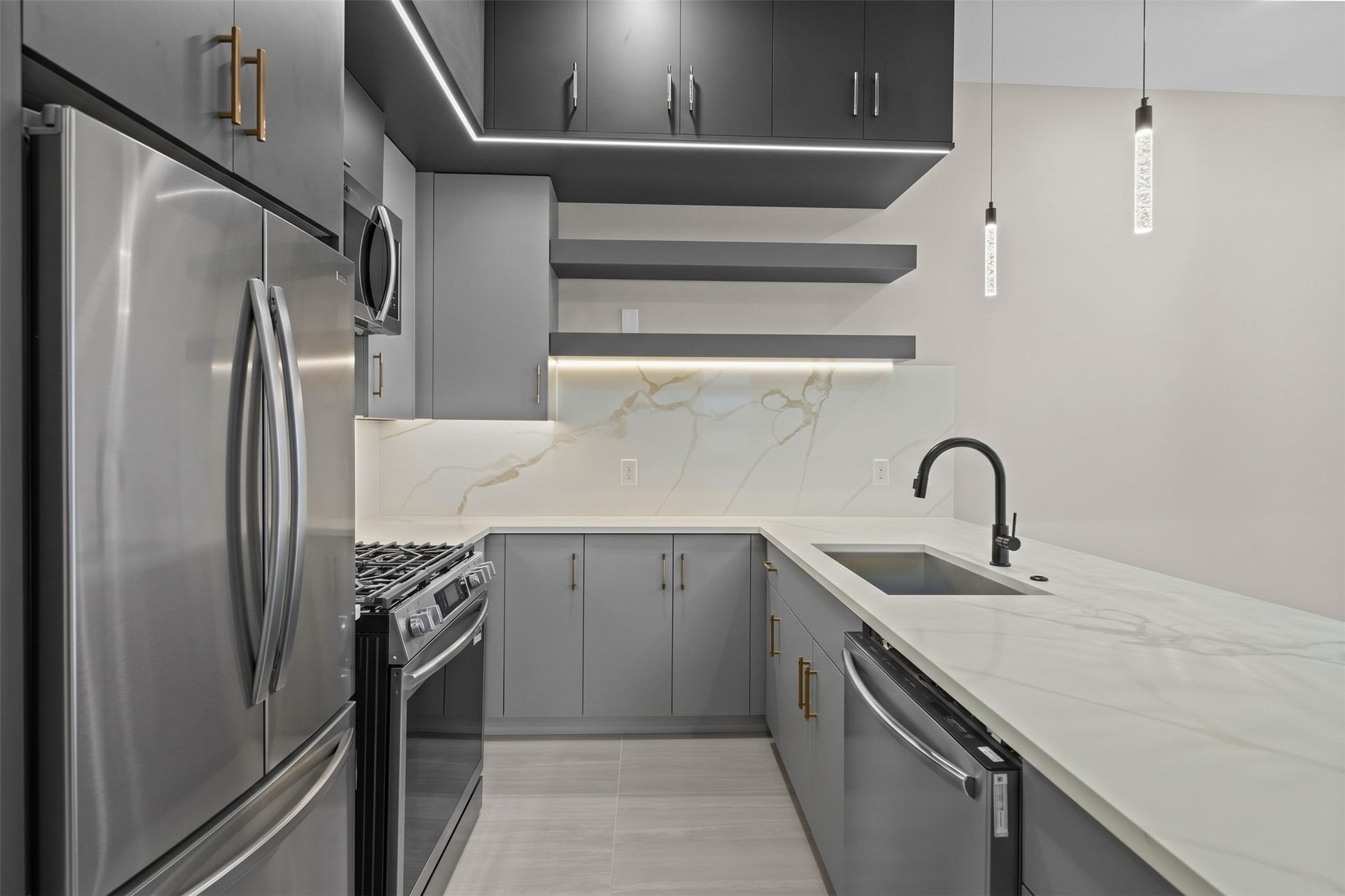 2412 Terry Street, #A, Houston, TX 77009 Virtually Staged: Sleek hardware, integrated appliances, and clean countertop surface area complete this refined, space-efficient design.