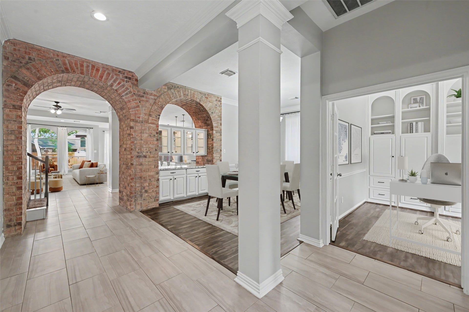 18207 Red Eagle Court, Humble, TX 77346 Private Office with french doors at the front of the home! Formal dining area with gorgeous built ins perfect to store and serve with easy access to kitchen! Look at that custom brick work! Virtually staged furniture.