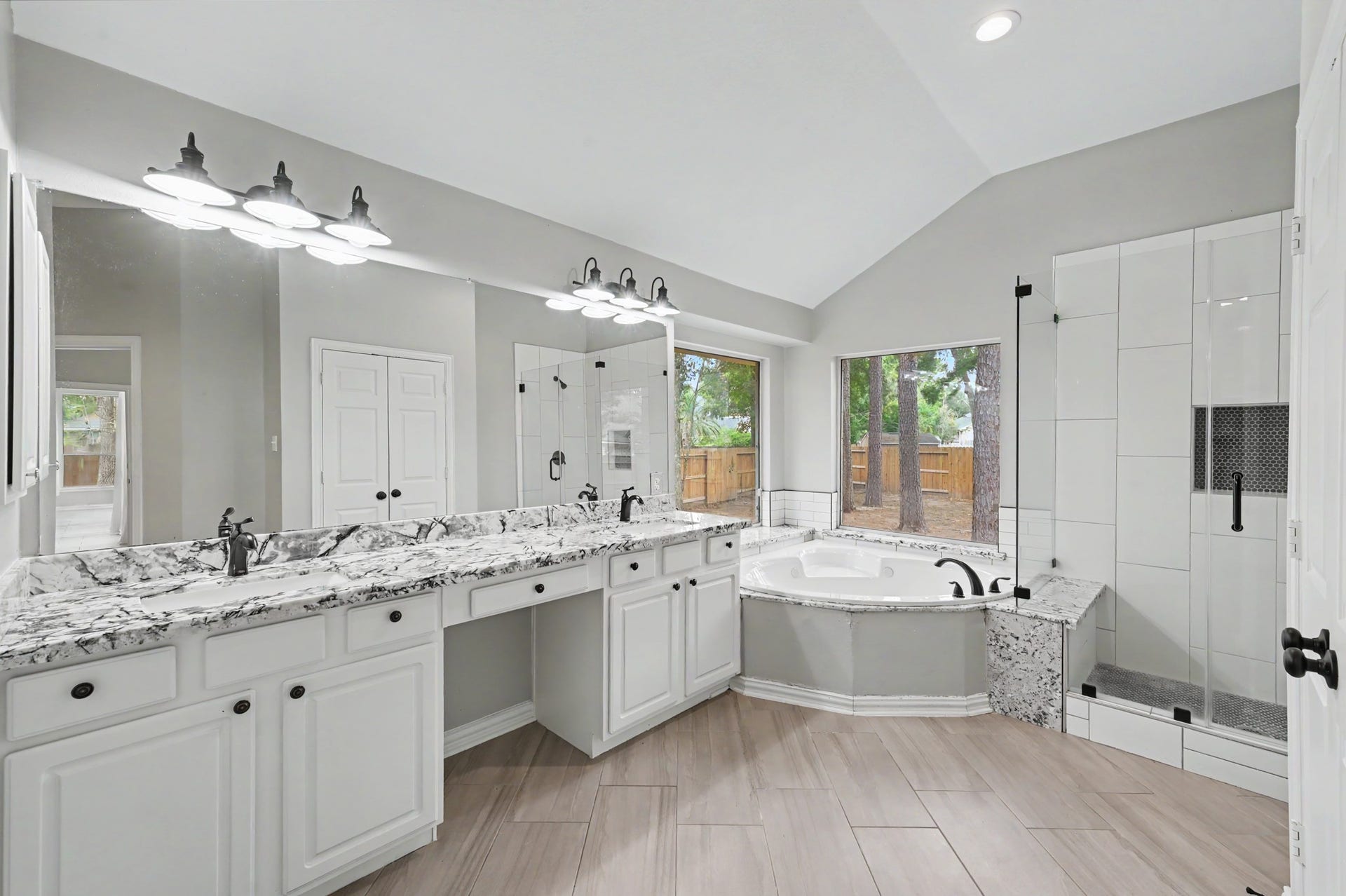 18207 Red Eagle Court, Humble, TX 77346 Luxurious and updated primary bathroom with jetted tub, separate shower and double vanity!