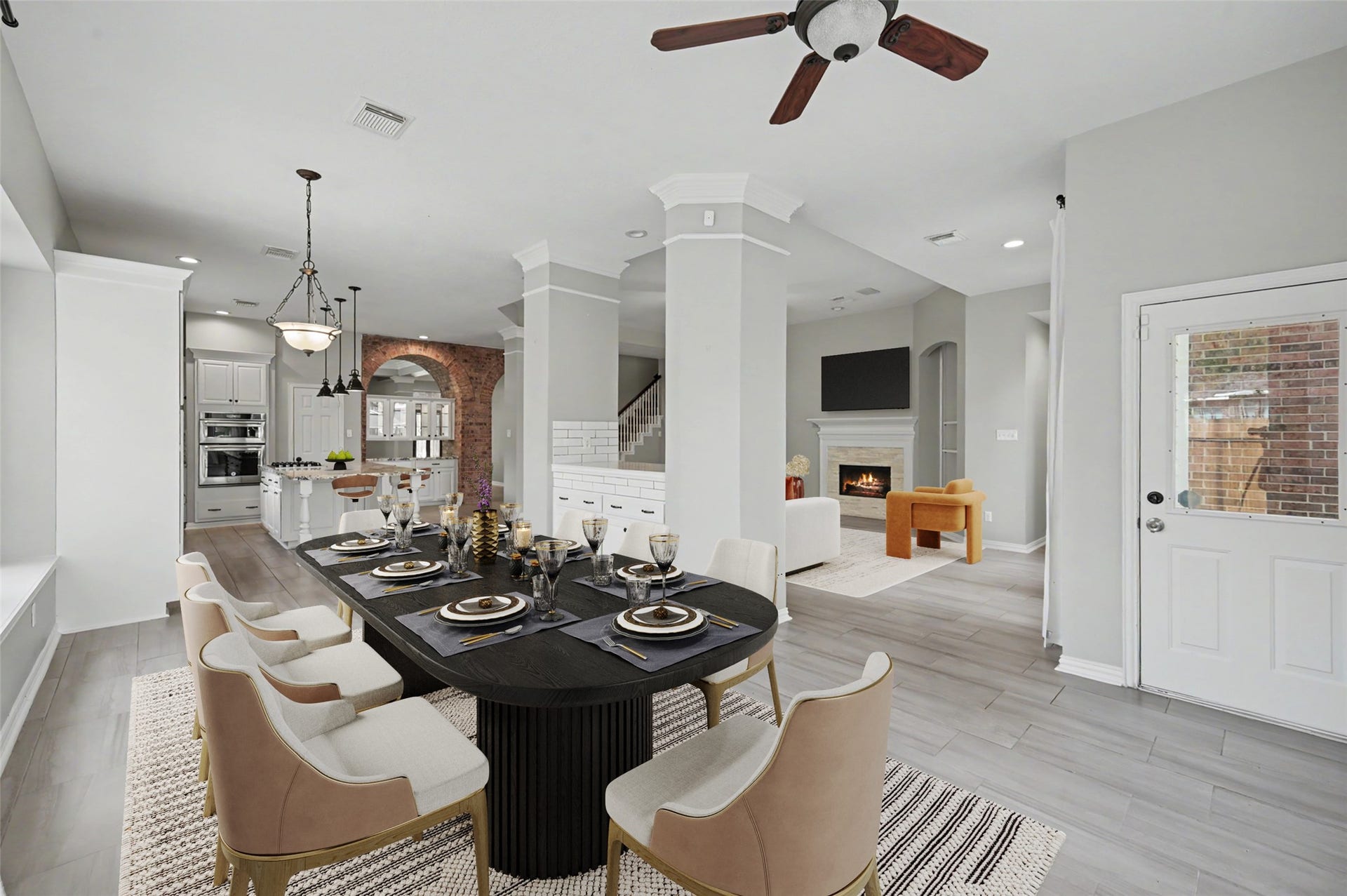 18207 Red Eagle Court, Humble, TX 77346 Breakfast area with tons of windows and natural light that fills the room! Beautiful Built ins between the living and breakfast room perfect for serving and storage! Furniture virtually staged.