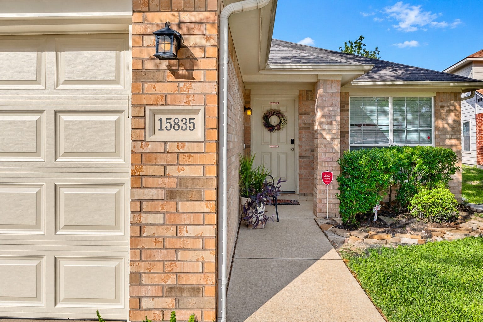 15835 Aldridge Creek Court, Cypress, TX 77429 Inviting covered front entrance with established landscaping and a convenient walkway from the driveway
