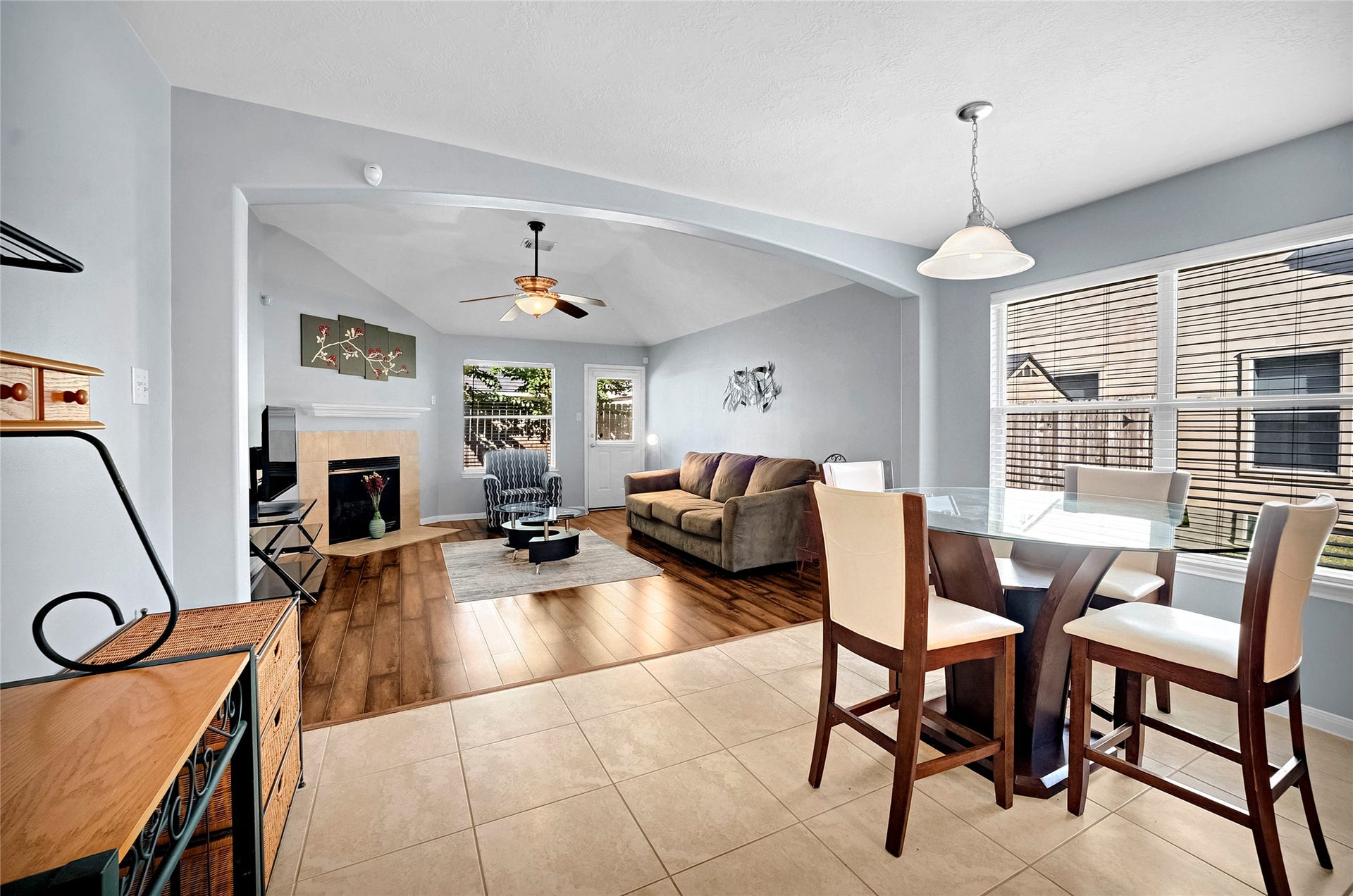 15835 Aldridge Creek Court, Cypress, TX 77429 Open-concept dining area flowing into the furnished family room.