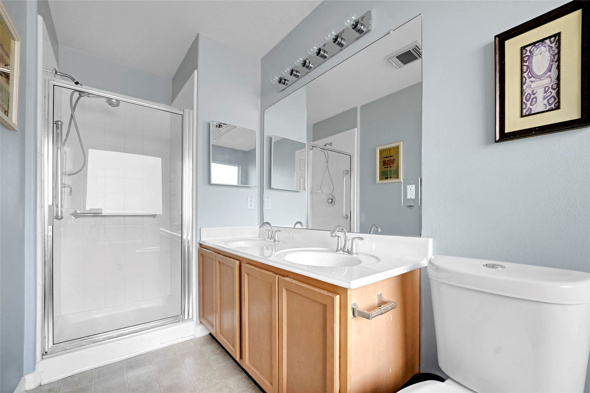 15835 Aldridge Creek Court, Cypress, TX 77429 Primary bathroom featuring a soaking tub, natural light, and vanity.