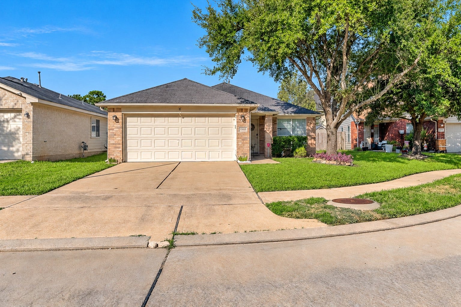 15835 Aldridge Creek Court, Cypress, TX 77429 Inviting covered front entrance with established landscaping and a convenient walkway from the driveway.