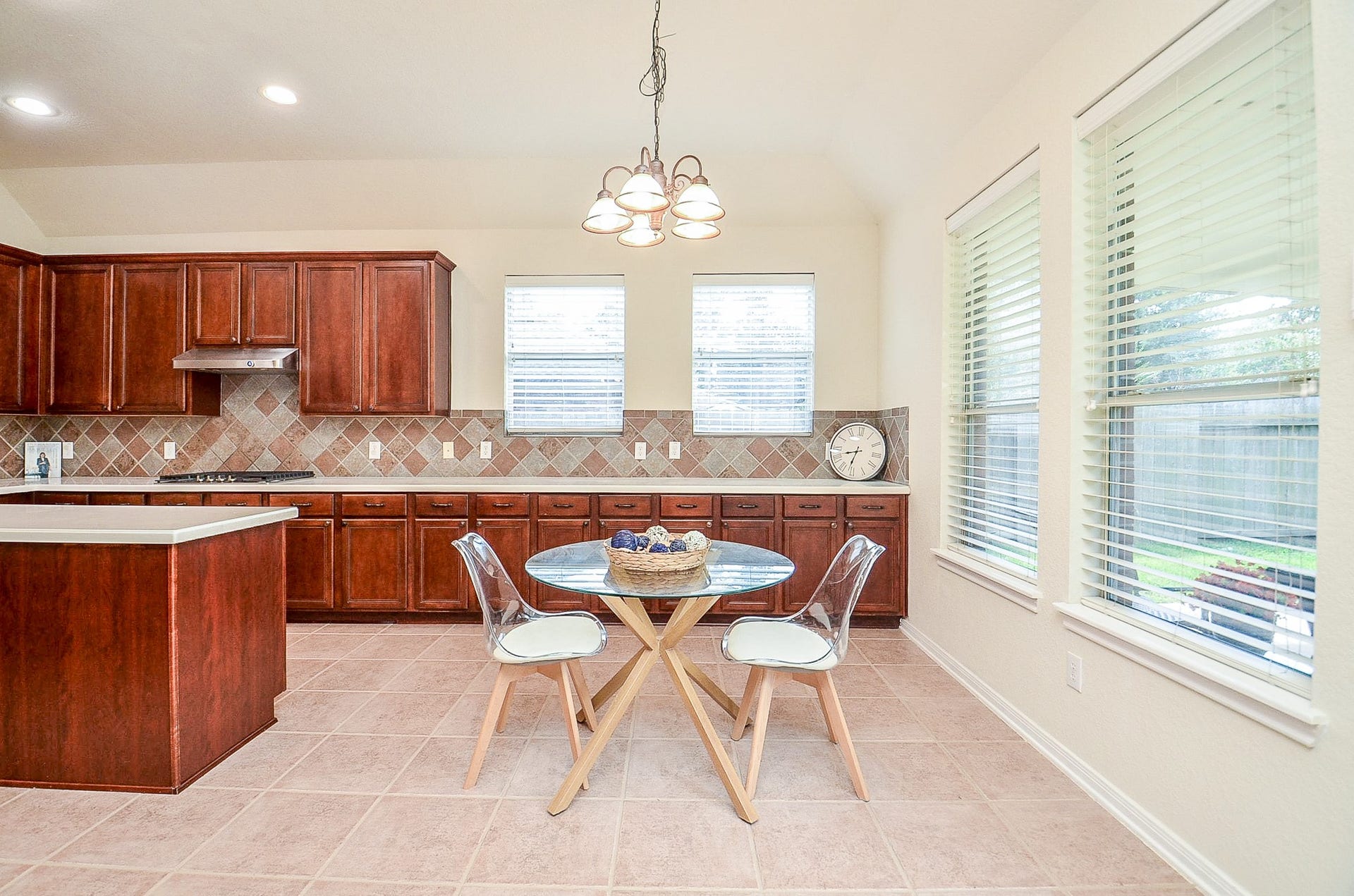 14407 Spanish River Lane, Cypress, TX 77429 Morning coffee, homework at the table or a casual dinner all fit naturally here. The kitchen offers an abundance of cabinetry and counter space with a sunny breakfast area just steps away.