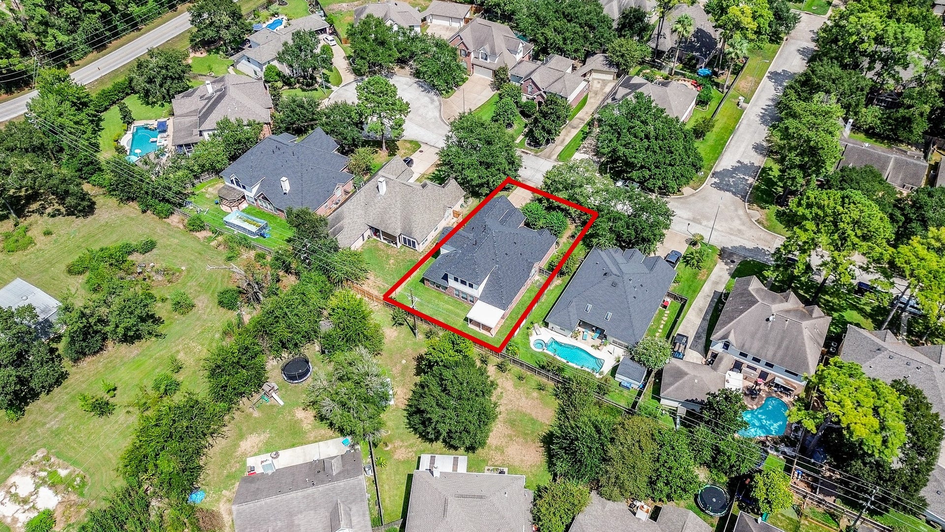 14407 Spanish River Lane, Cypress, TX 77429 A birds-eye view puts the property into perspective, highlighting its setting among tree-lined streets and established homes in Northlake Forest.