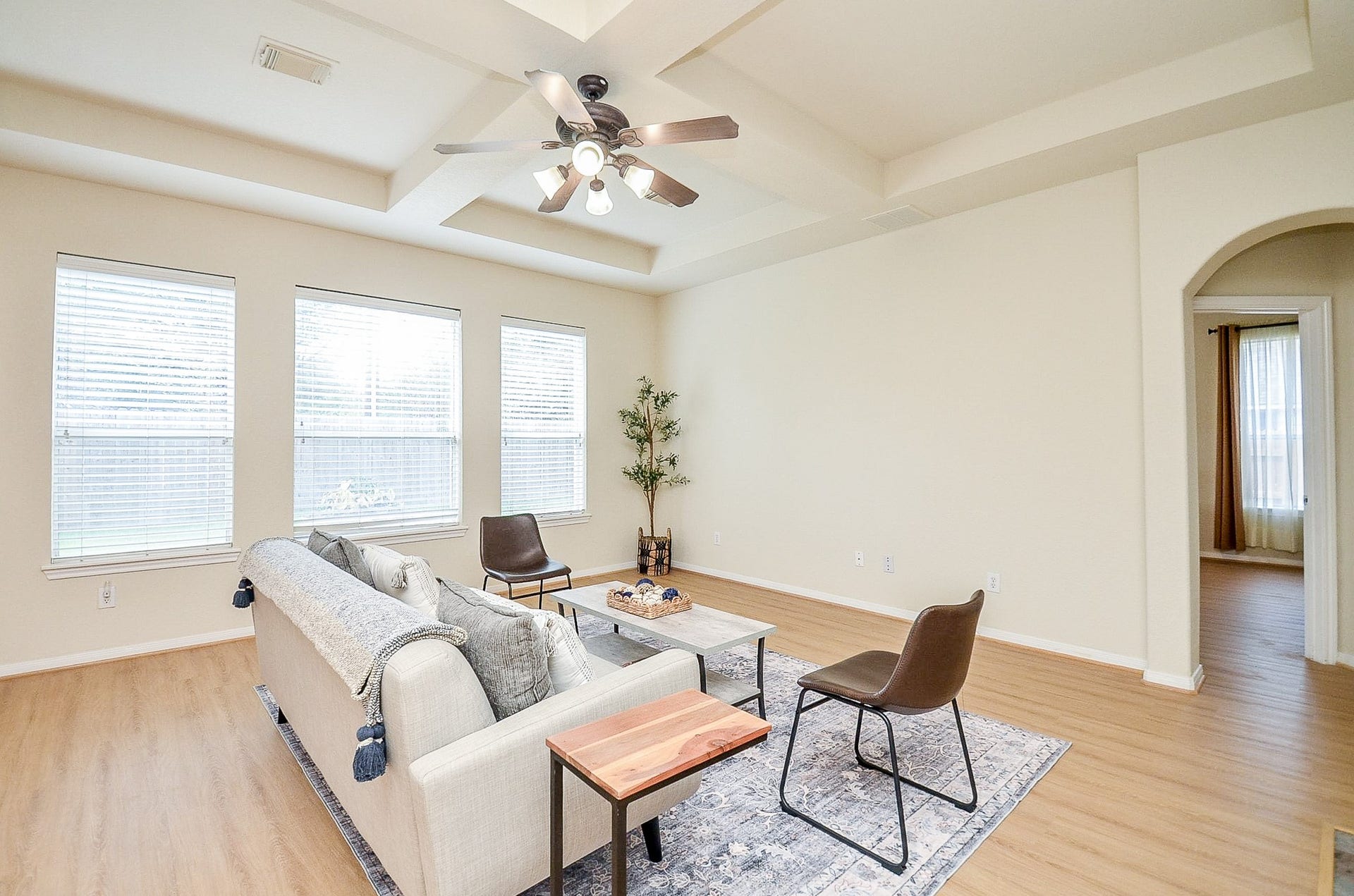 14407 Spanish River Lane, Cypress, TX 77429 This is where everyday life can settle in. The spacious family room gives you room for a full seating arrangement, while three large windows bring in natural light and the detailed ceiling adds character overhead.