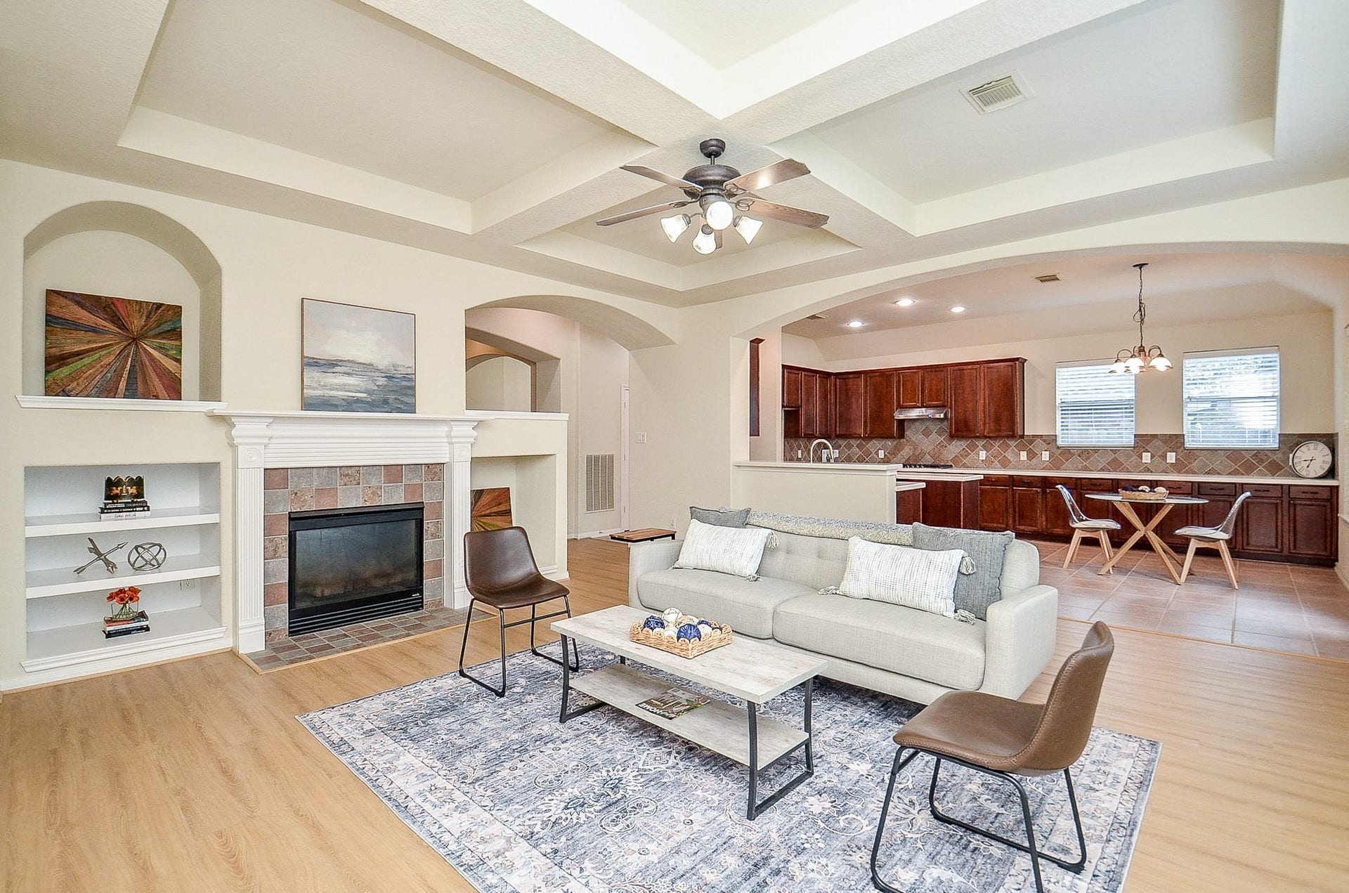 14407 Spanish River Lane, Cypress, TX 77429 The heart of the home brings everyone together. The spacious family room opens directly to the kitchen and breakfast area, with a fireplace, built-ins and architectural ceiling detail adding character to the everyday living space.