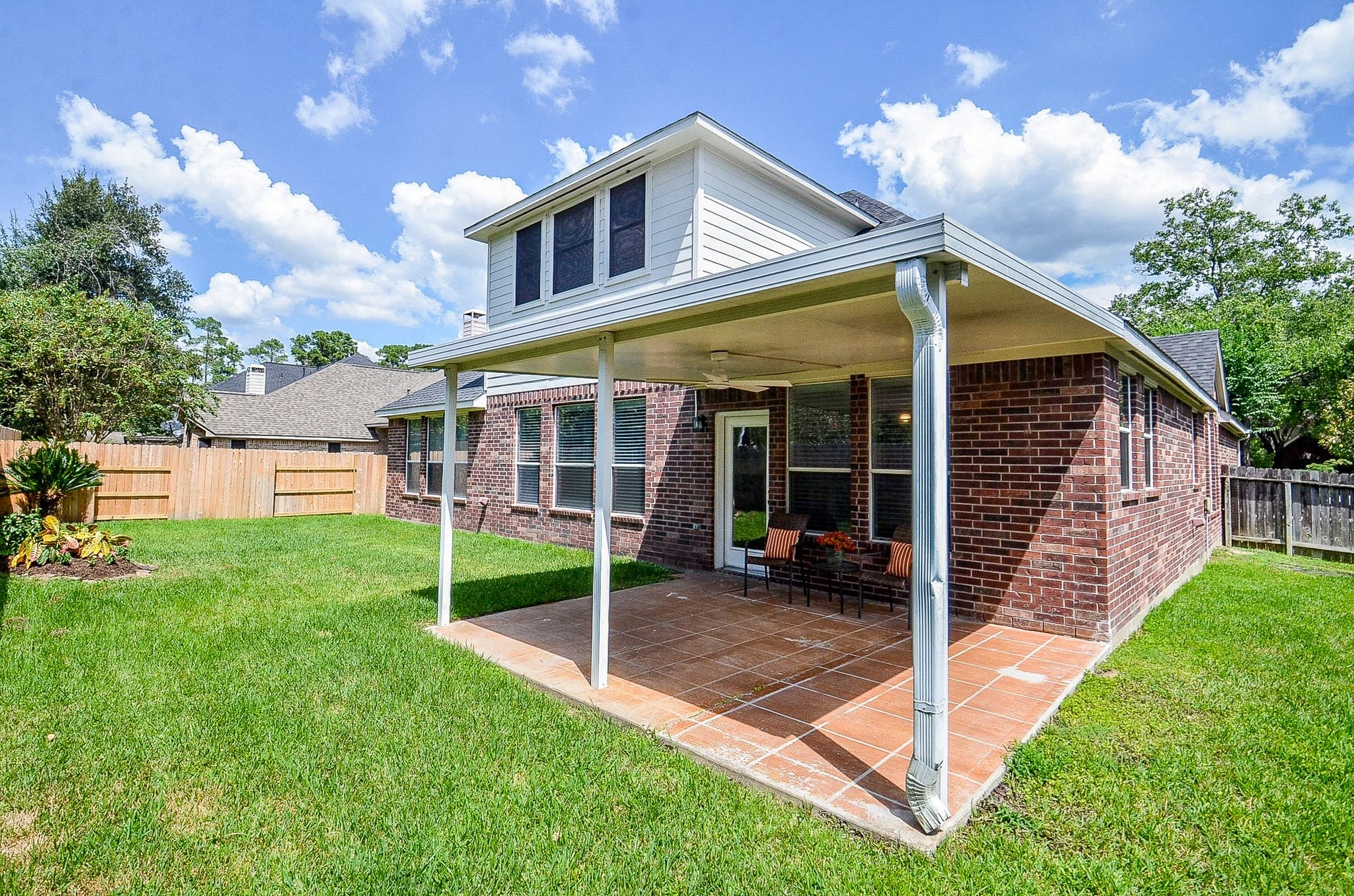 14407 Spanish River Lane, Cypress, TX 77429 Weekend plans can happen right at home. Set up the grill, add a dining table and settle in under the covered patio while still having plenty of grassy yard beyond for kids, pets and outdoor fun.