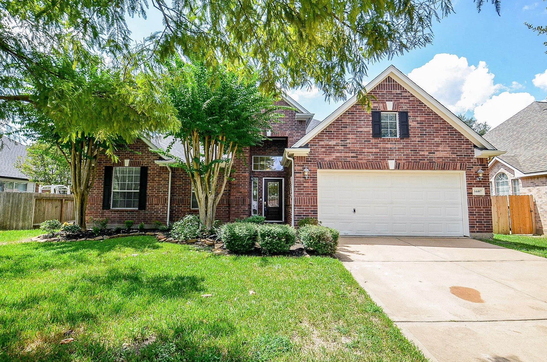 14407 Spanish River Lane, Cypress, TX 77429 Mature trees, established landscaping and a classic brick exterior create a welcoming first impression. Tucked into Northlake Forest, this is a home that feels settled into its surroundings from the moment you arrive.