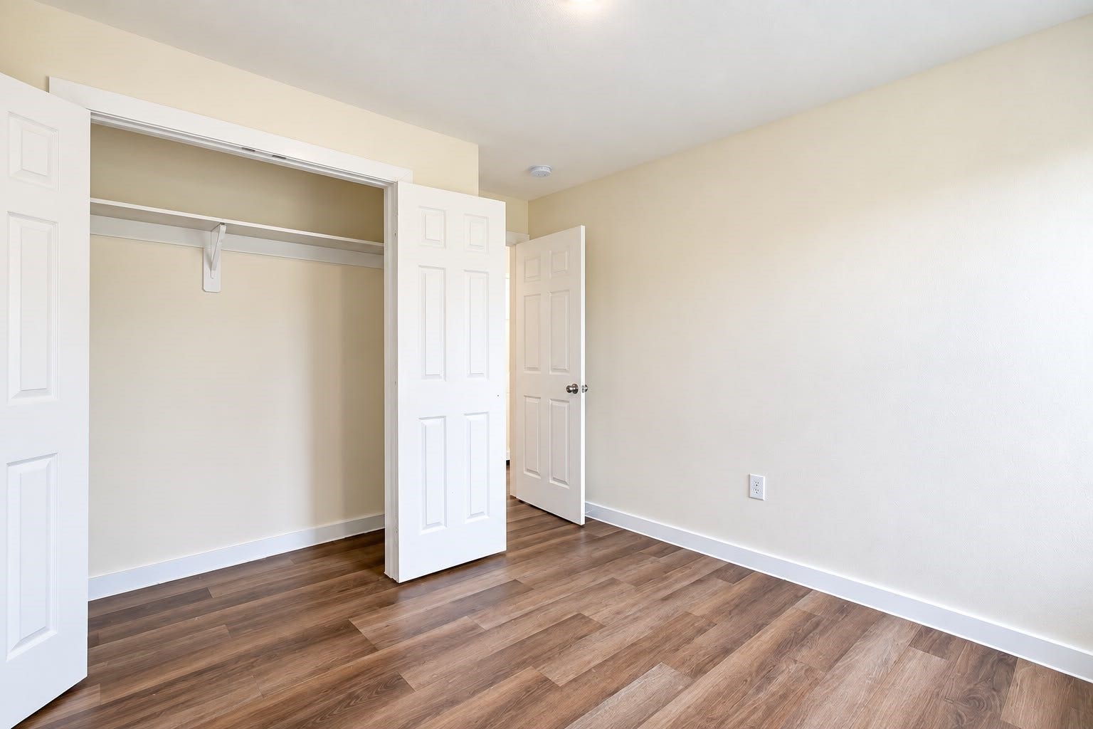 8204 Eastover Street, #A, Houston, TX 77028 Bedroom with a large double door closet and wood style floors.