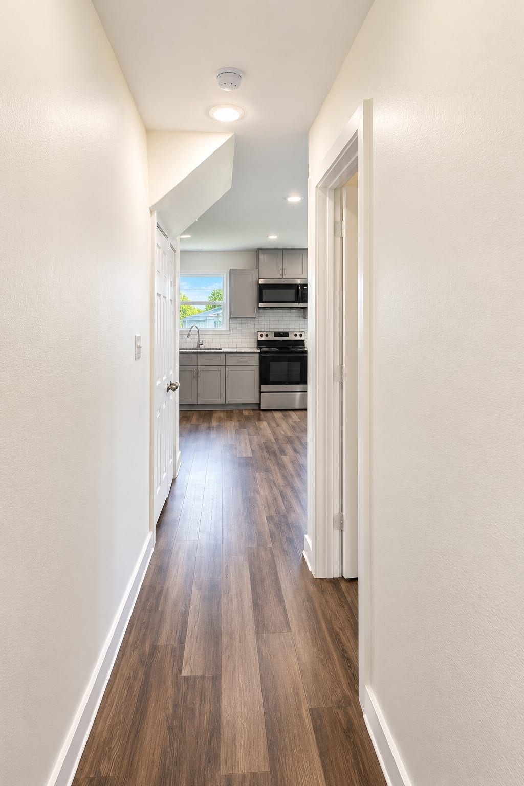 8204 Eastover Street, #A, Houston, TX 77028 Hallway with wood style flooring throughout, no carpet to maintain.